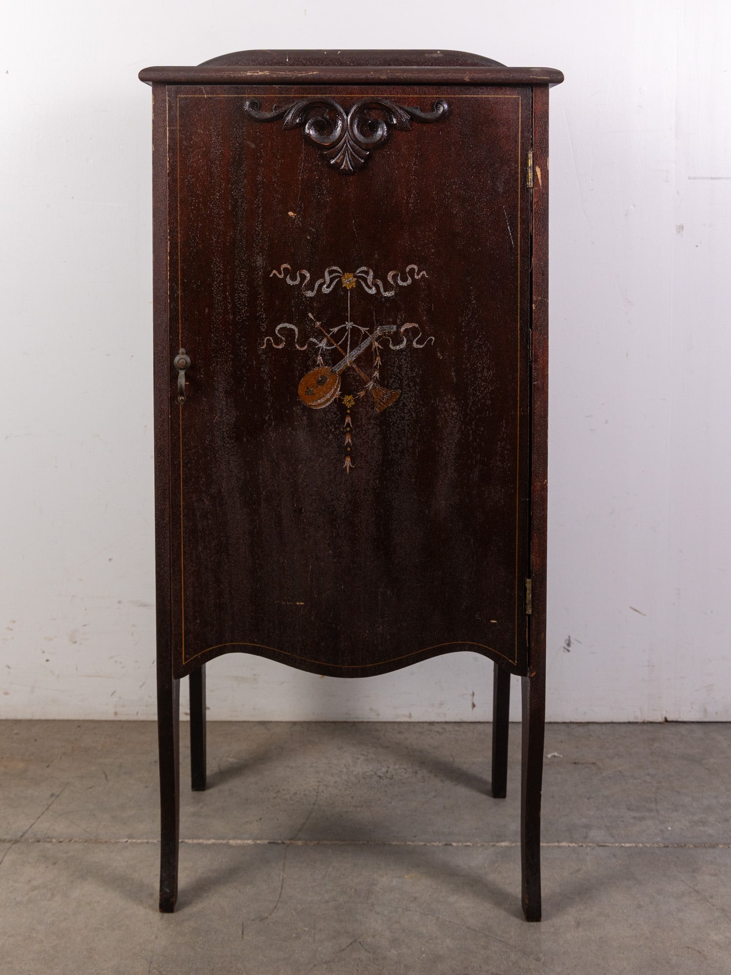 Antique Mahogany Music Cabinet: Antique Mahogany Music CabinetSize40" x 18" x 13"LiteratureBrooks Auction – Online Auction Terms & Conditions Contact: (856) 694-2960 | info@brooks.auction READ BEFORE YOU BID: We want you to