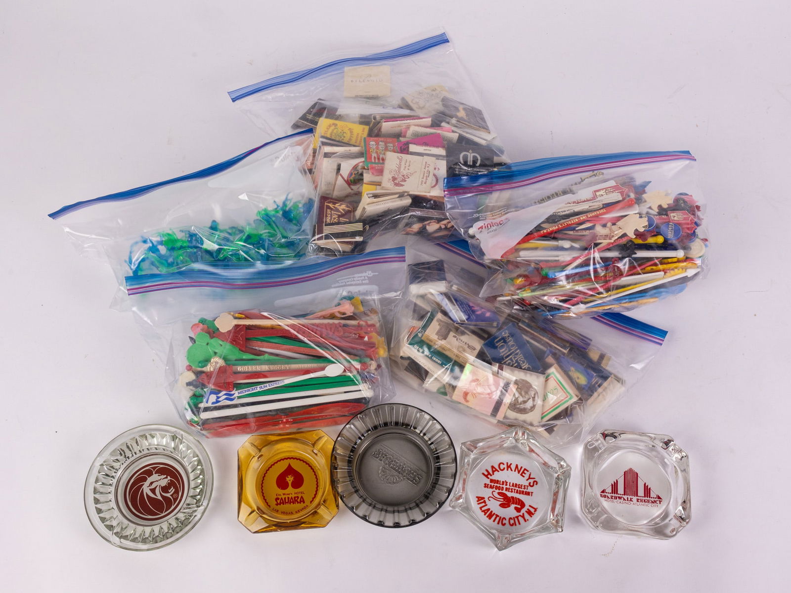 Drink Stirrers, Matchbooks, and Ashtrays Featuring Atlantic City: Drink Stirrers, Matchbooks, and Ashtrays Featuring Atlantic CitySize7" x 12" x 12"LiteratureBrooks Auction – Online Auction Terms & Conditions Contact: (856) 694-2960 | info@brooks.auction READ