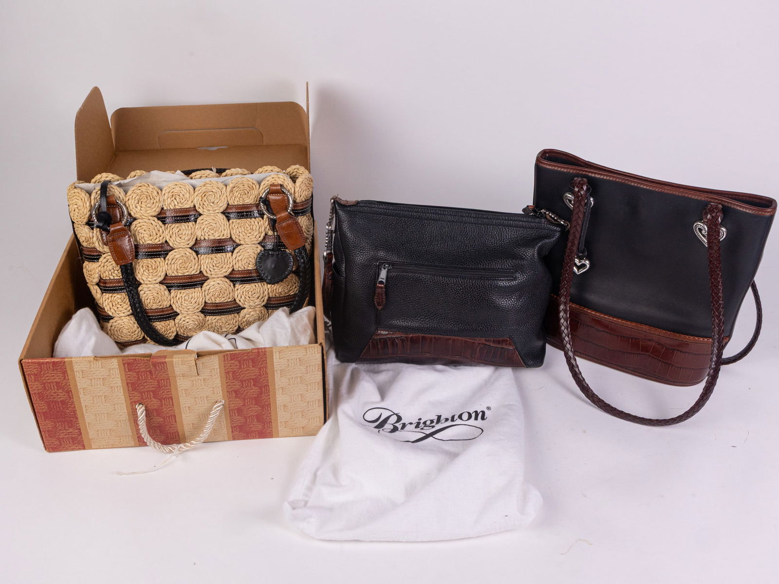 Three Brighton Leather Purses: Three Brighton Leather PursesSize9" HLiteratureBrooks Auction – Online Auction Terms & Conditions Contact: (856) 694-2960 | info@brooks.auction READ BEFORE YOU BID: We want you to feel