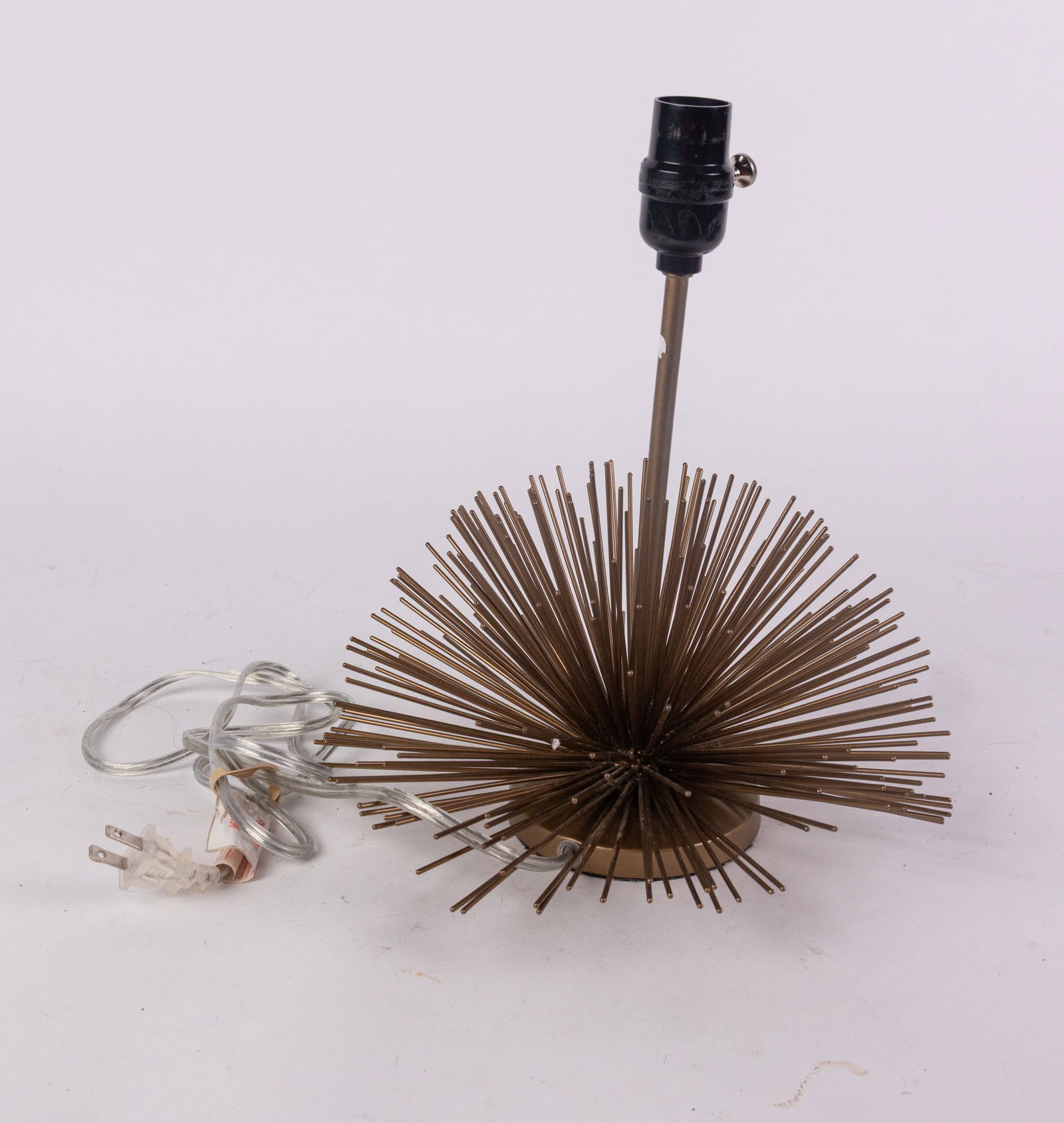 Mid Century Style Starburst Table Lamp: Mid Century Style Starburst Table LampSize13" HLiteratureBrooks Auction – Online Auction Terms & Conditions Contact: (856) 694-2960 | info@brooks.auction READ BEFORE YOU BID: We want you to