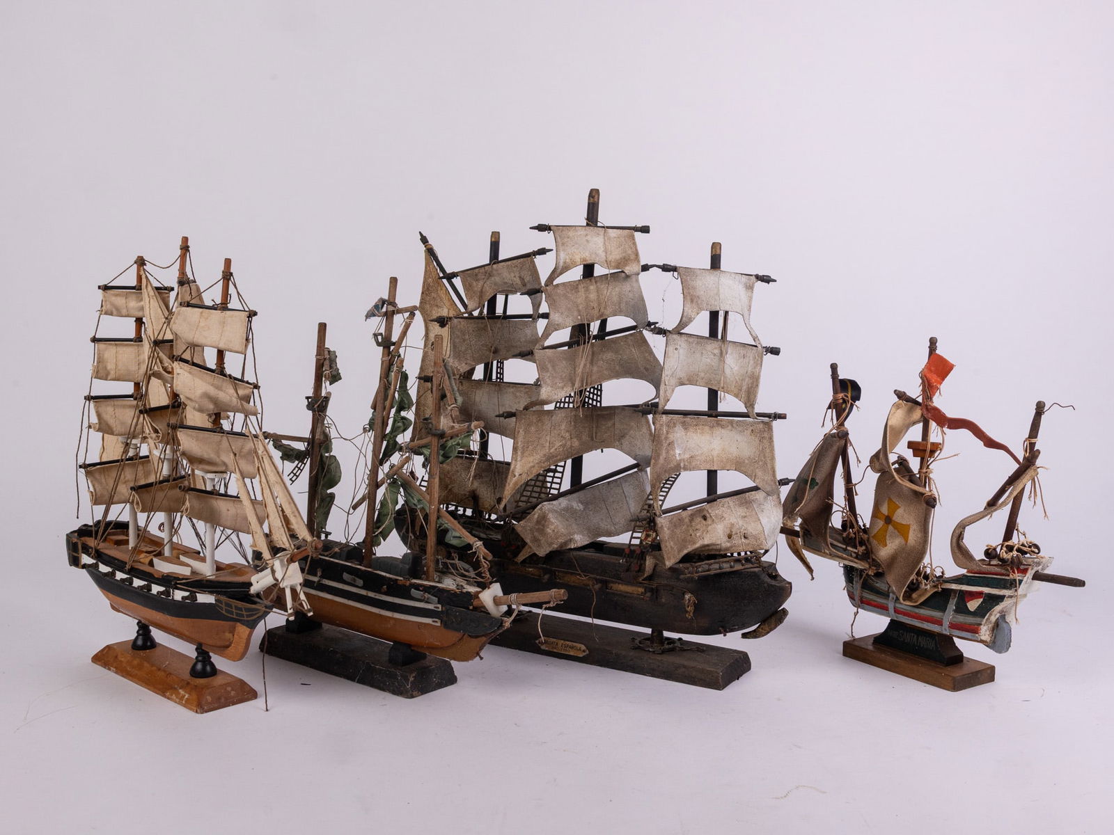 Four Vintage Model Ships: Four Vintage Model ShipsSize15" HLiteratureBrooks Auction – Online Auction Terms & Conditions Contact: (856) 694-2960 | info@brooks.auction READ BEFORE YOU BID: We want you to feel confident