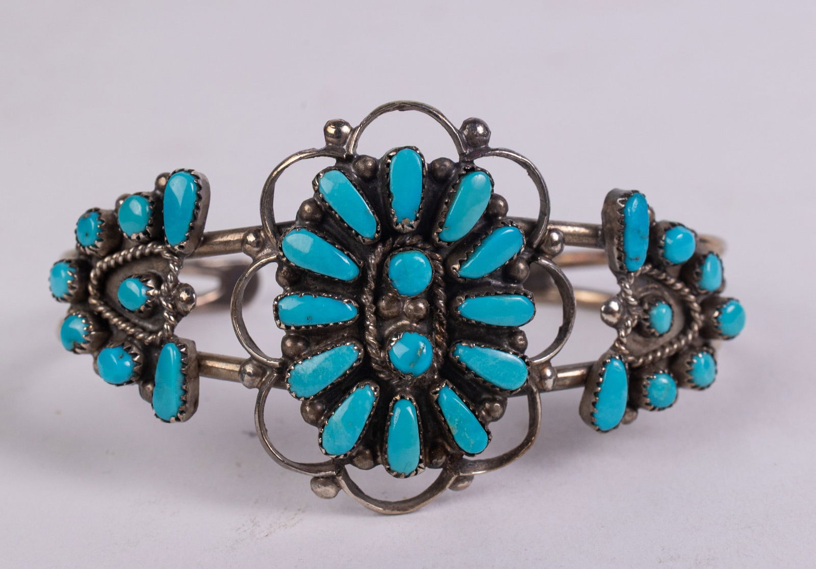 Signed and Stamped Zuni Sterling SIlver and Turquoise Vintage Cuff Bracelet: Signed and Stamped Sterling SIlver and Turquoise Cuff BraceletLiteratureBrooks Auction – Online Auction Terms & Conditions Contact: (856) 694-2960 | info@brooks.auction READ BEFORE YOU BID: We
