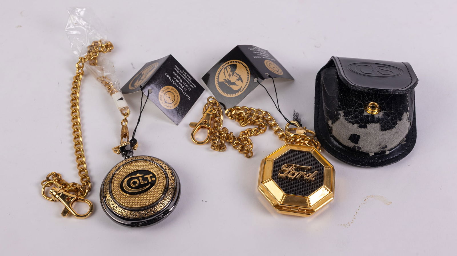 2 Franklin Mint Collector Pocket Watches: 2 Franklin Mint Collector Pocket Watches Colt and Ford Editions 1 caseLiteratureBrooks Auction – Online Auction Terms & Conditions Contact: (856) 694-2960 | info@brooks.auction READ BEFORE YOU