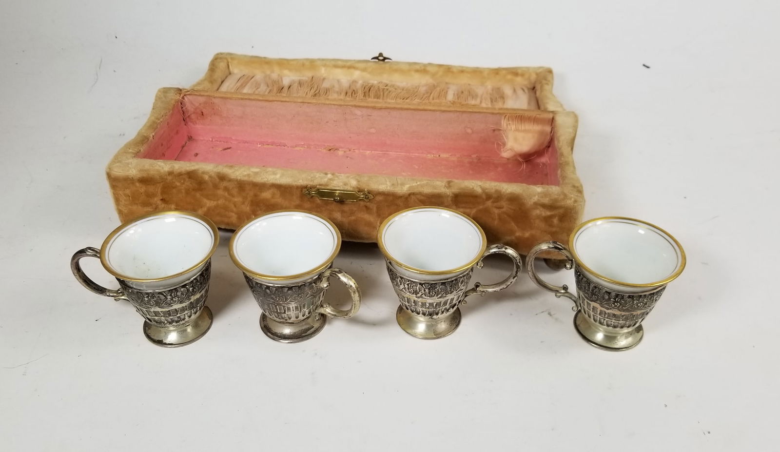 Sterling Stamped Vintage Silver Demitasse Cups with Porcelain Liners 4pc set: Sterling Stamped Vintage Silver Demitasse Cups with Porcelain Liners 4pc setLiteratureBrooks Auction – Online Auction Terms & Conditions Contact: (856) 694-2960 | info@brooks.auction READ