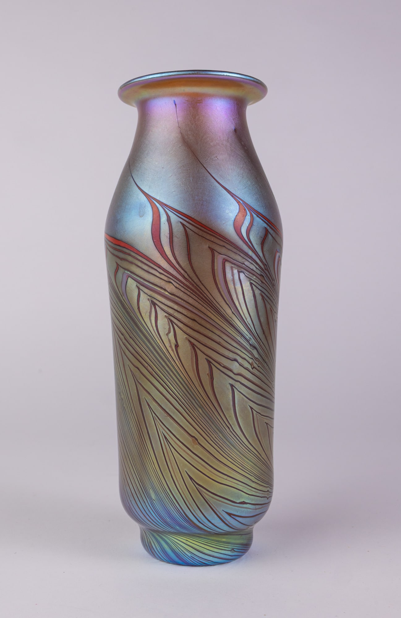 Lundberg Studios Attr. | Iridescent Pulled Feather Vase: From Lundberg Studios website, "We are a premier art glass manufacturing company. For over 47 years, we have produced some of the finest art glass of our times. Lundberg Studios is located in the