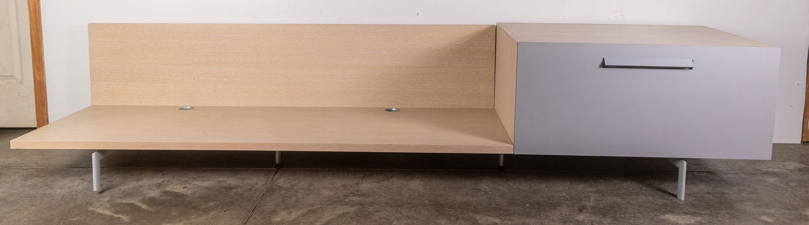 Peter Maly | Ligne Roset "Brera" Unit: This sleek modern piece from the renowned Ligne Roset features a low profile and neutral tones that would fit in any design forward living space Size 22" x 104" x 24" Literature Brooks Auction –