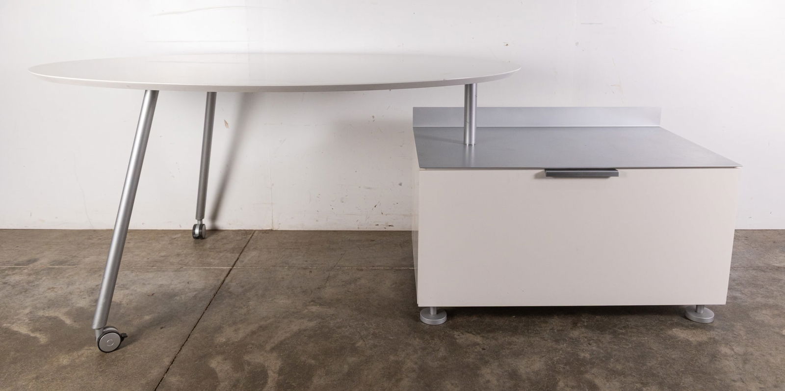 Christian Werner | Ligne Roset "Everywhere" Desk: The Everywhere desk is a compact, minimalist workspace designed for flexibility and modern living. Featuring clean lines, lightweight construction, and a streamlined silhouette, it can be easily