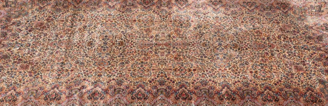 Karastan Kirman Wool Persian Area Rug: The Kirman 759 rug by Karastan is a classic American-made wool rug inspired by traditional Persian Kirman designs. Power-loomed for durability, it features an intricate all-over floral pattern with so