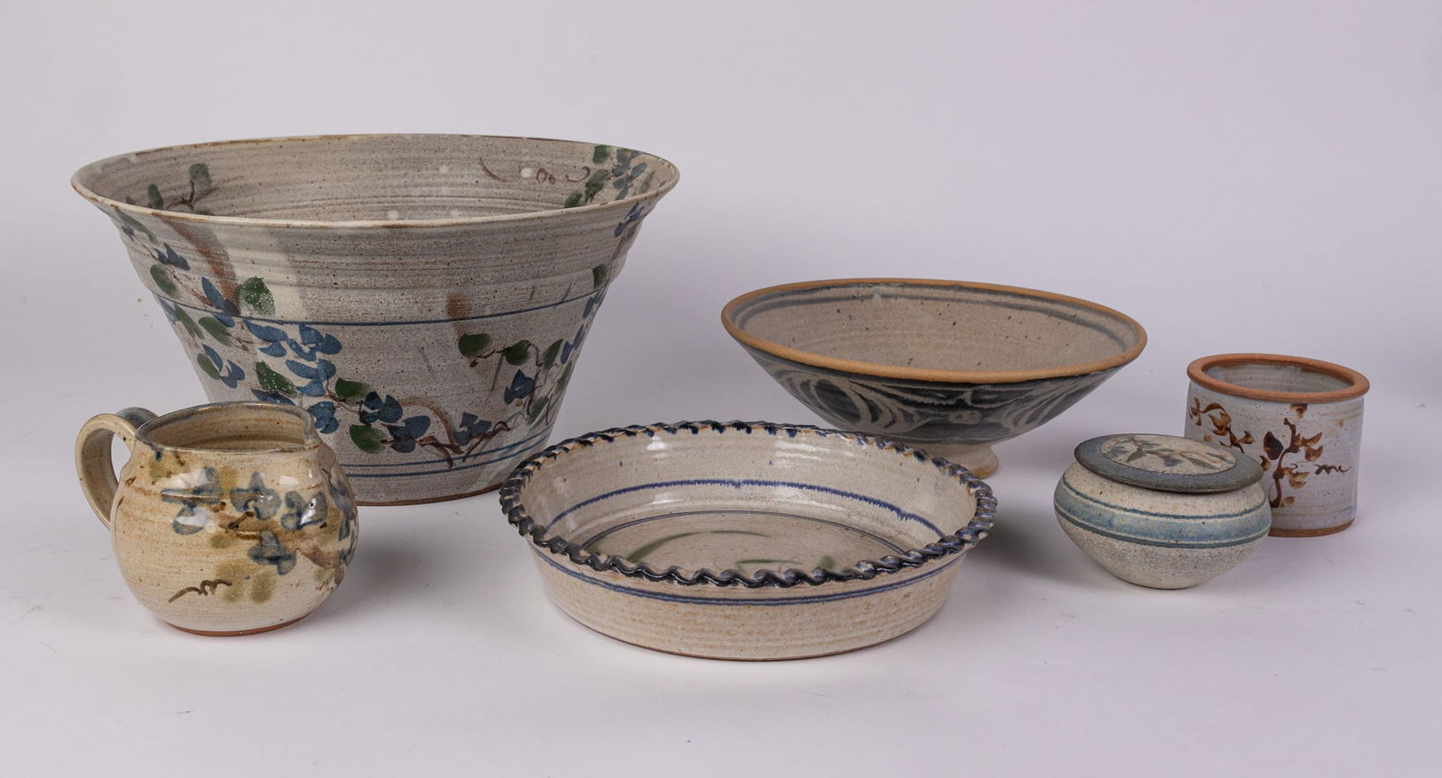 Lily Schor | Grouping of Studio Pottery: Lily Schor is an American ceramicist based in upstate New York who has been honing her craft since 1968. She creates pieces that are meant to be "enjoyed for their beauty, ease of use and for their