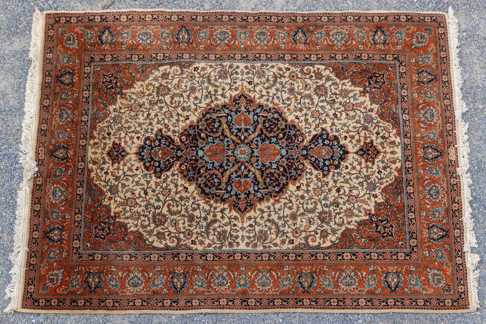 Hand Knotted Qom Persian Area Rug: This rug features a cream-colored field , a dark central medallion, and intricate floral motifs.Size126" x 94"LiteratureBrooks Auction – Online Auction Terms & Conditions Contact: (856)