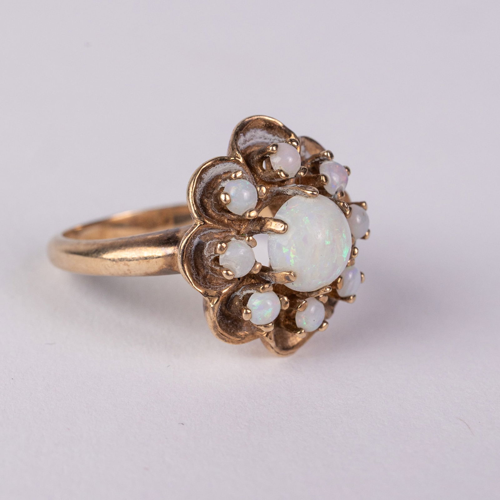 10KY Gold Opal Ring: Marked "10K AJ", size 6.5, total weight 5.88 grams.LiteratureBrooks Auction – Online Auction Terms & Conditions Contact: (856) 694-2960 | info@brooks.auction READ BEFORE YOU BID: We want you to