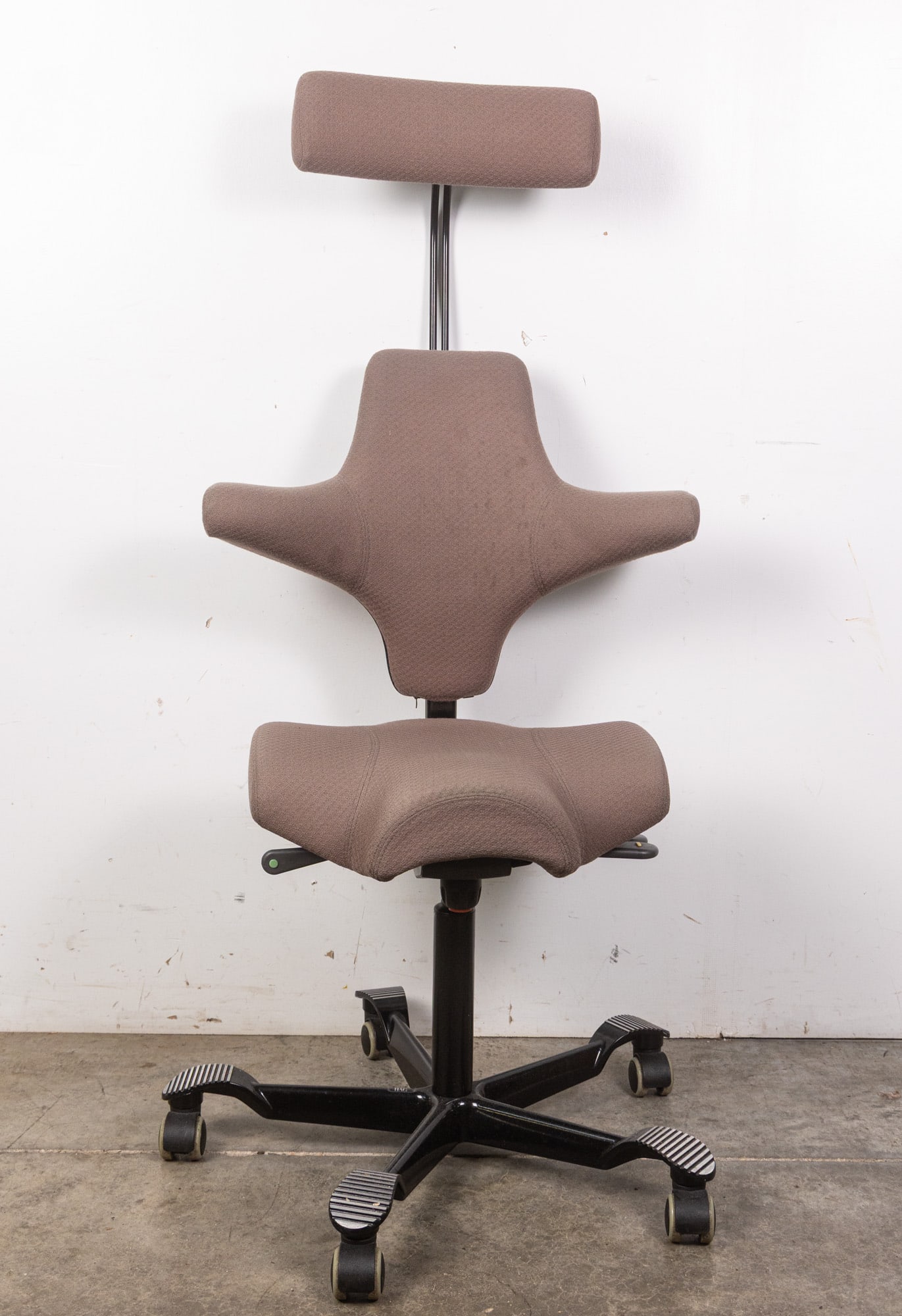 HAG | Capisco Saddle Seat Adjustable Work Chair: The Capisco office chair by HÅG is an iconic ergonomic seat designed to encourage active, flexible sitting. Inspired by a horse saddle, its distinctive shape supports a wide range of positions pr