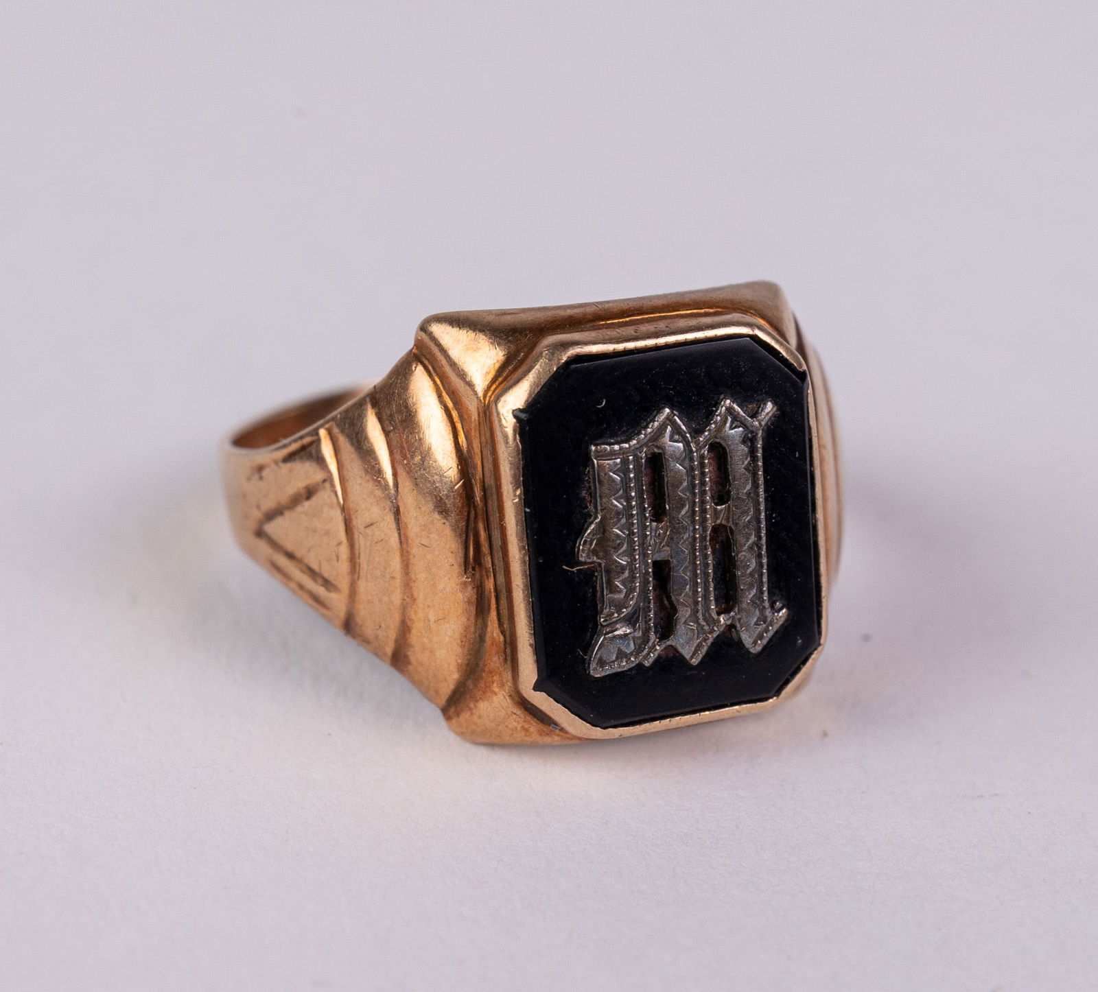 10KY "M" Signet Gold Ring: marked "10K SMC", size 10, total weight 3.5 gramsLiteratureBrooks Auction – Online Auction Terms & Conditions Contact: (856) 694-2960 | info@brooks.auction READ BEFORE YOU BID: We want you to