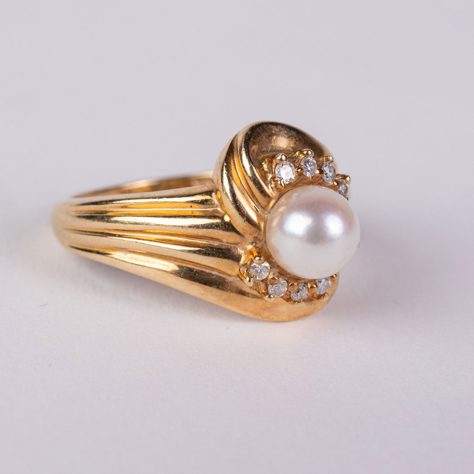 14KY Gold Pearl & Diamond Ring: Marked "14K", size 7, total weight 4.36 grams.LiteratureBrooks Auction – Online Auction Terms & Conditions Contact: (856) 694-2960 | info@brooks.auction READ BEFORE YOU BID: We want you to feel