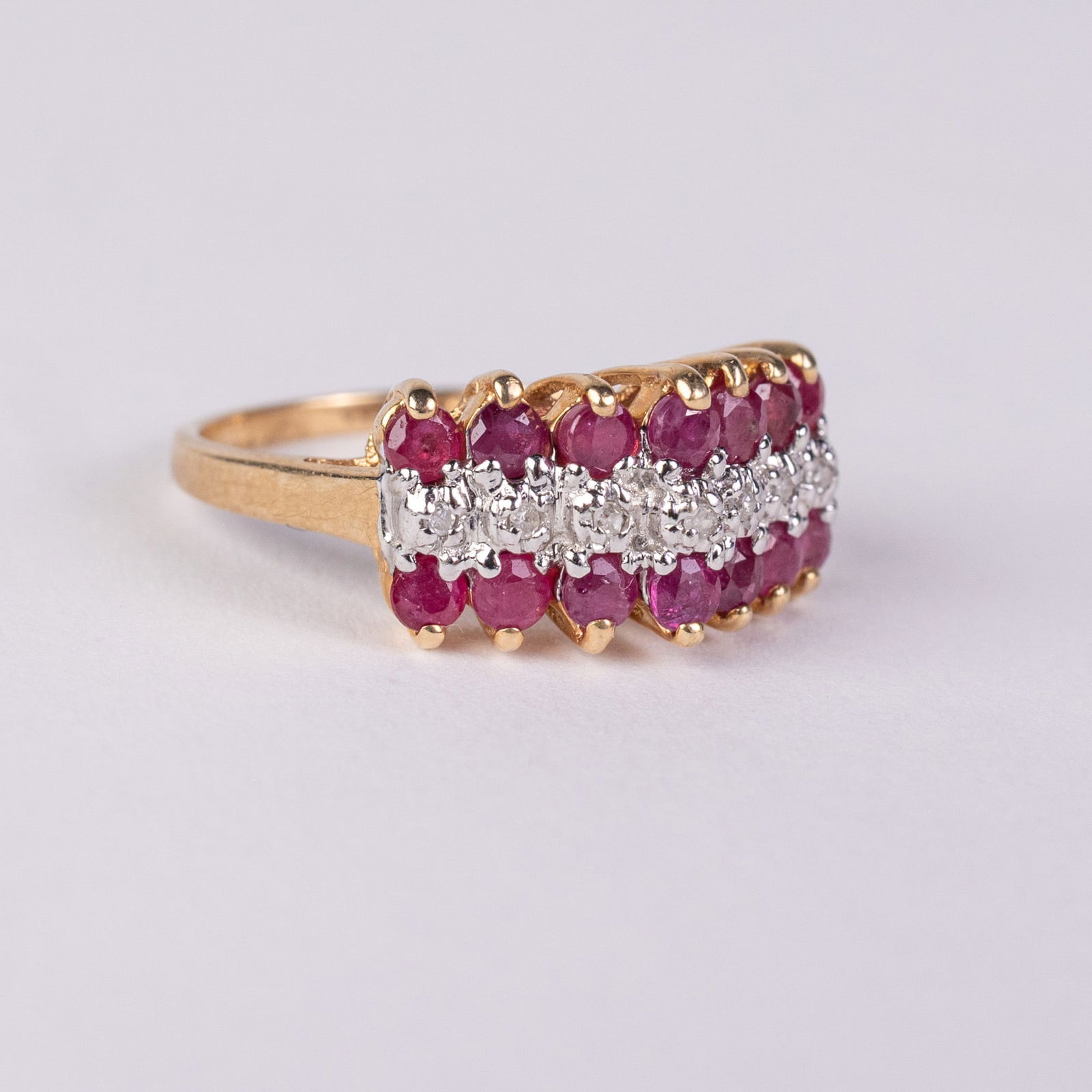 10KY Gold Ruby & Diamond Ring: Marked "♡ 10K", size 6, total weight 2.27 grams.LiteratureBrooks Auction – Online Auction Terms & Conditions Contact: (856) 694-2960 | info@brooks.auction READ BEFORE YOU BID: We want you