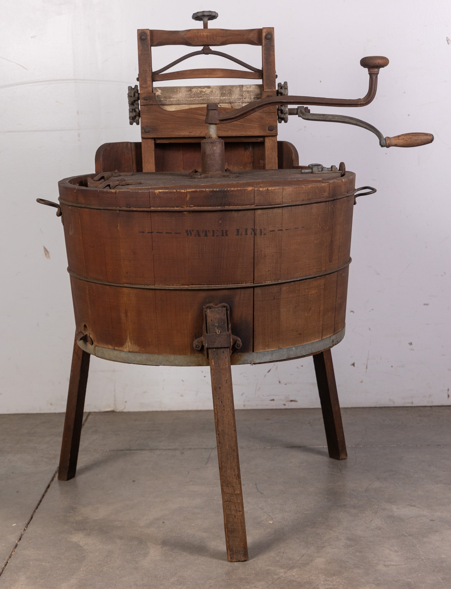 Antique Primitive Red Star Washing Machine w/ Local Branding: The mark reads: "Red Star Washing Machine John N. Mullen MFR. Reading, PA." and the opposite side is marked "Water Line"Size41" x 34" x 28"LiteratureBrooks Auction – Online Auction Terms &