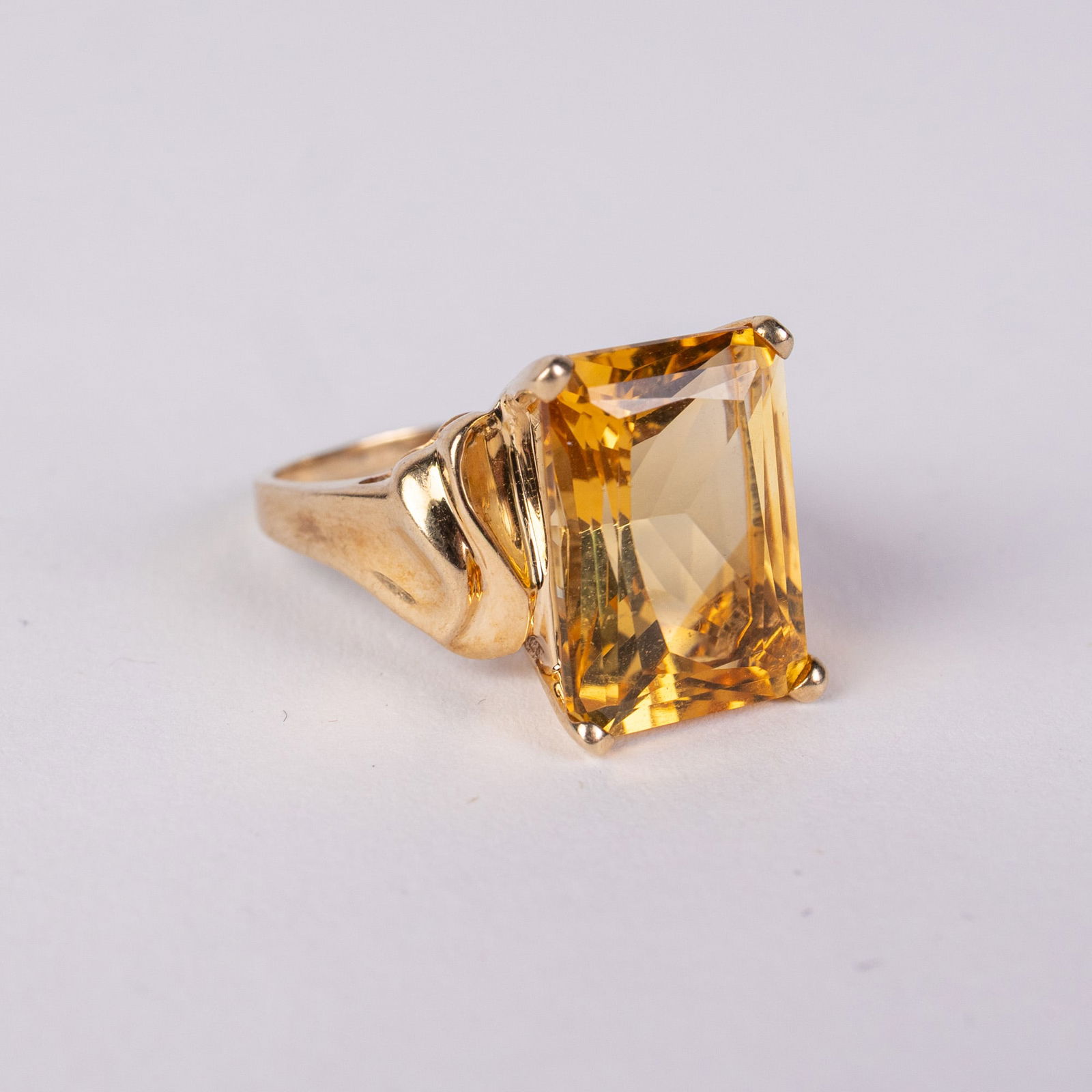 10KY Gold Citrine Ring: Marked "10K ⟡", size 7 , total weight 4.84 grams.LiteratureBrooks Auction – Online Auction Terms & Conditions Contact: (856) 694-2960 | info@brooks.auction READ BEFORE YOU BID: We want