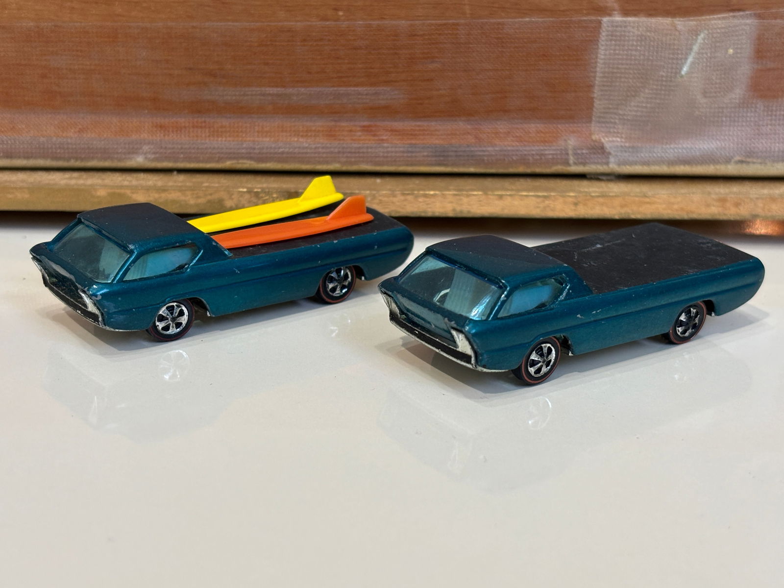 Pair of Hot Wheels Redline Aqua Deora Trucks with Button - 2