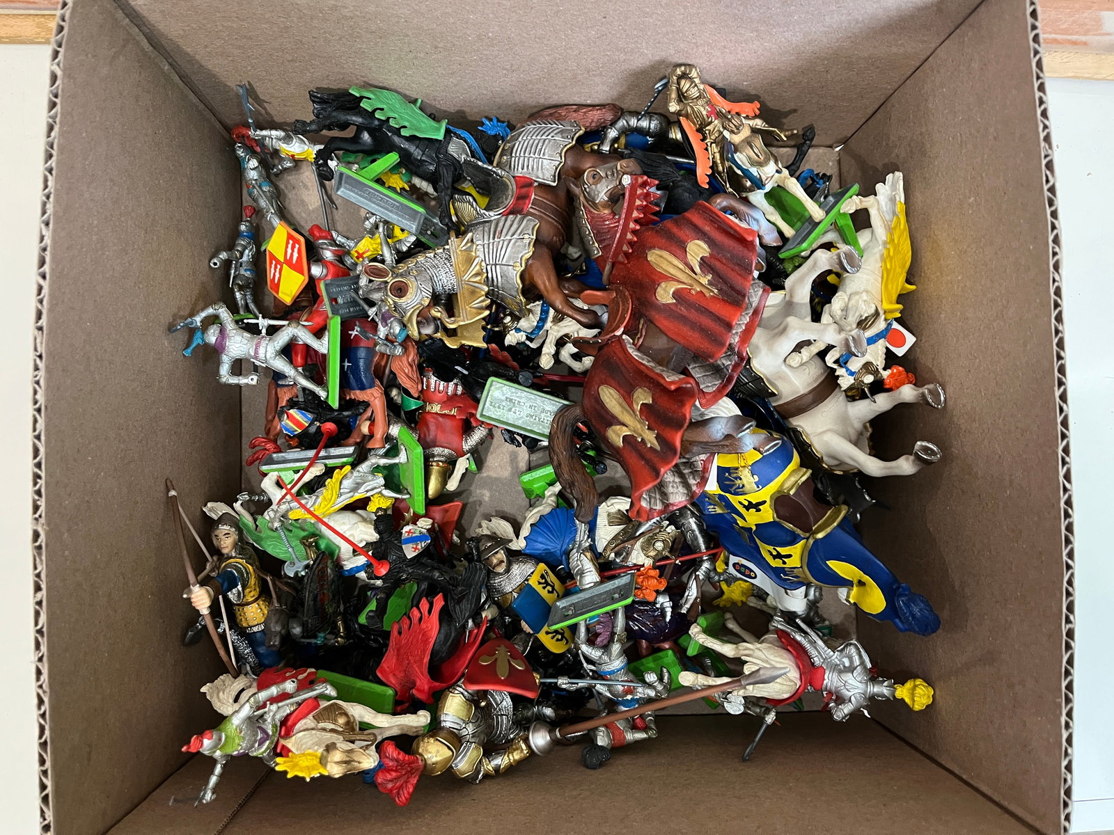 Assortment of Knight and Horse Figurines: Assortment of Knight and Horse Figurines featuring Britains and Schleich Literature Brooks Auction – Online Auction Terms & Conditions Contact: (856) 694-2960 | info@brooks.auction READ BEFORE Y