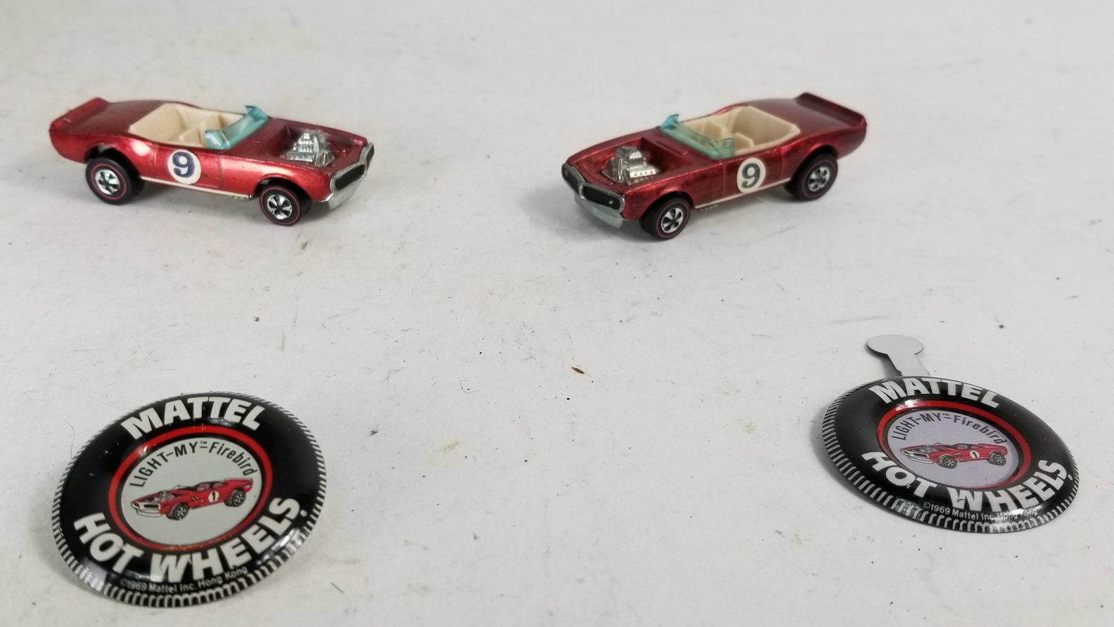 Pair of Hotwheels Redline Red Chrome Light-My-Firebirds with Button: Pair of Hotwheels Redline Red Chrome Light-My-Firebirds with ButtonLiteratureBrooks Auction – Online Auction Terms & Conditions Contact: (856) 694-2960 | info@brooks.auction READ BEFORE YOU