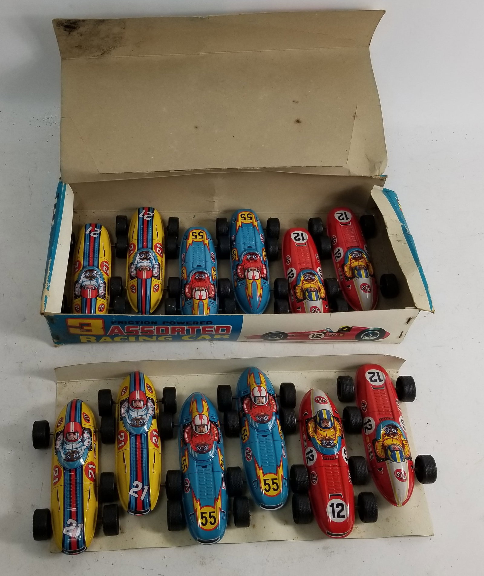 Vintage Sanko Friction Racing Cars in Original Box: Twelve Vintage Sanko Friction Racing Cars in Original BoxLiteratureBrooks Auction – Online Auction Terms & Conditions Contact: (856) 694-2960 | info@brooks.auction READ BEFORE YOU BID: We want