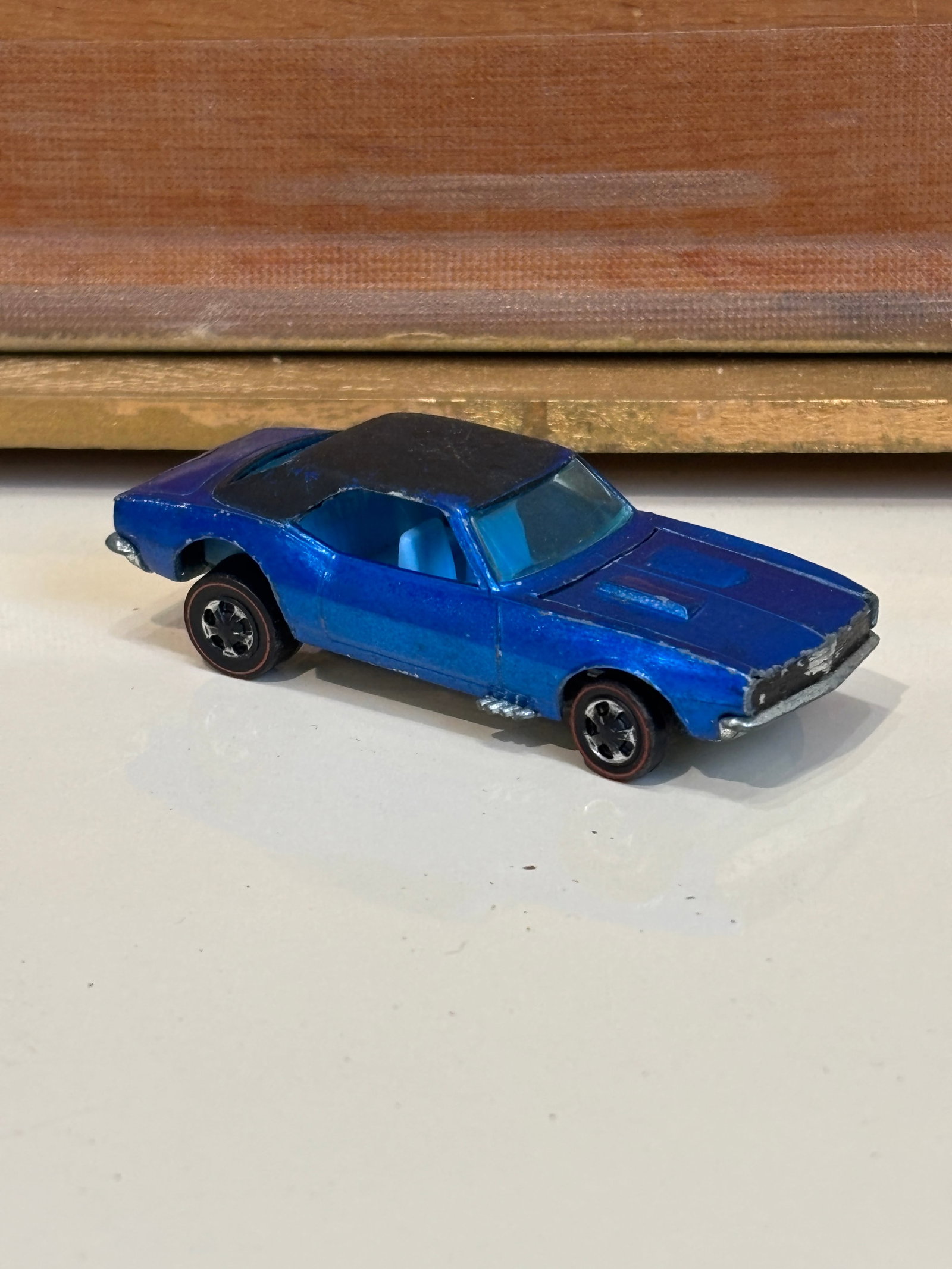 Hot Wheels Redline Spectraflame Blue Custom Camaro: Hot Wheels Redline Spectraflame Blue Custom Camaro with white interiorLiteratureBrooks Auction – Online Auction Terms & Conditions Contact: (856) 694-2960 | info@brooks.auction READ BEFORE YOU