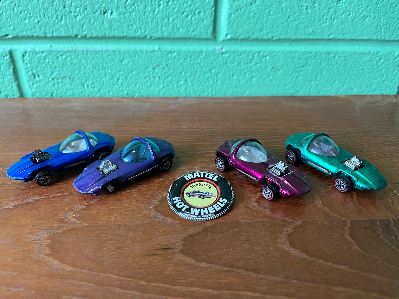 Four Hot Wheels Redline Silhouette Cars with Button: Four Hot Wheels Redline Silhouette Cars with Button Literature Brooks Auction – Online Auction Terms & Conditions Contact: (856) 694-2960 | info@brooks.auction READ BEFORE YOU BID: We want you t