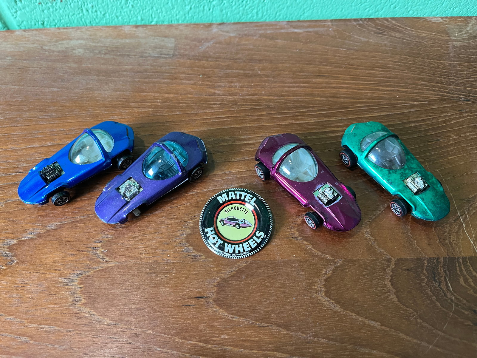 Four Hot Wheels Redline Silhouette Cars with Button - 2