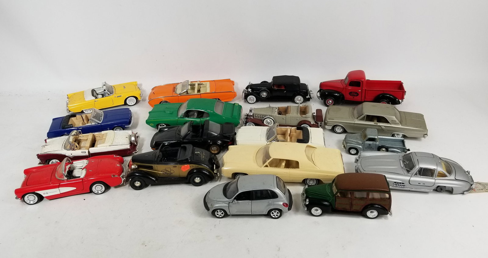 Assortment of Model Vehicles: Assortment of Model Vehicles featuring Danbury and Franklin Mint Literature Brooks Auction – Online Auction Terms & Conditions Contact: (856) 694-2960 | info@brooks.auction READ BEFORE YOU BID: