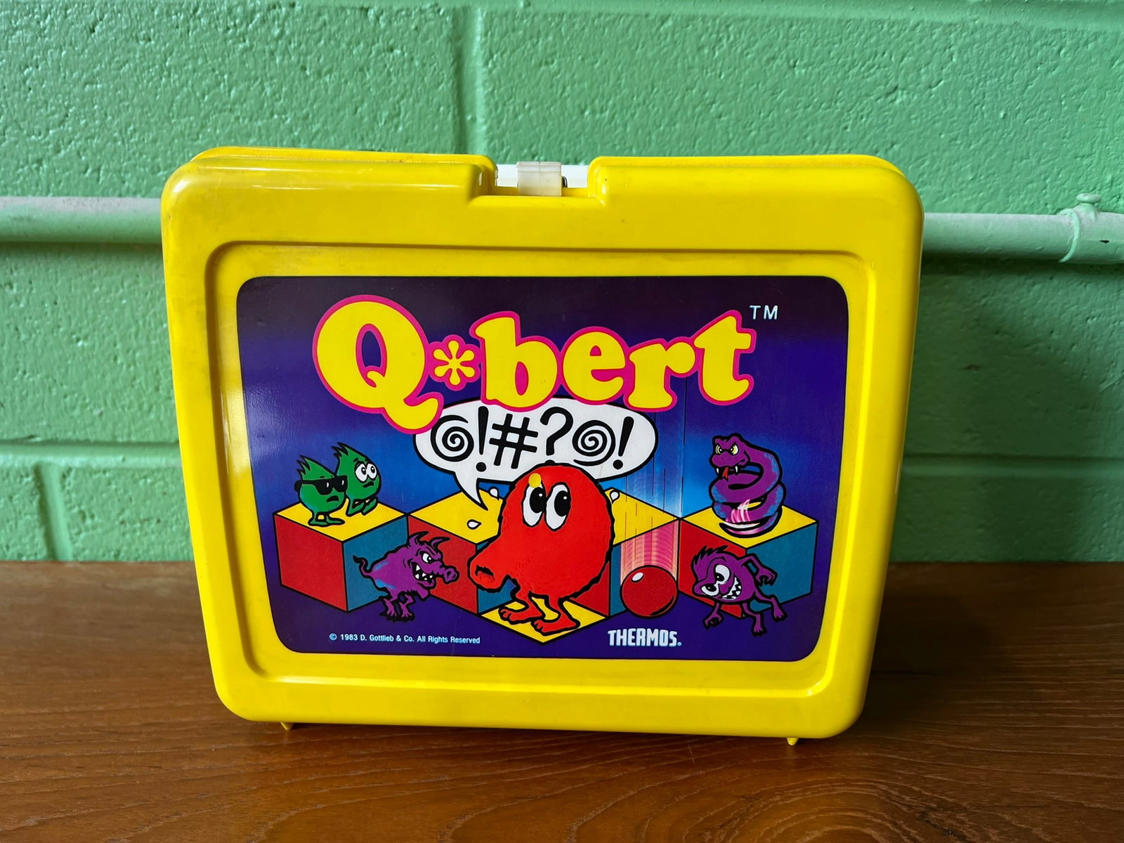 Vintage Q*bert Lunchbox and Thermos: Vintage Q*bert Lunchbox and Thermos Literature Brooks Auction – Online Auction Terms & Conditions Contact: (856) 694-2960 | info@brooks.auction READ BEFORE YOU BID: We want you to feel confident