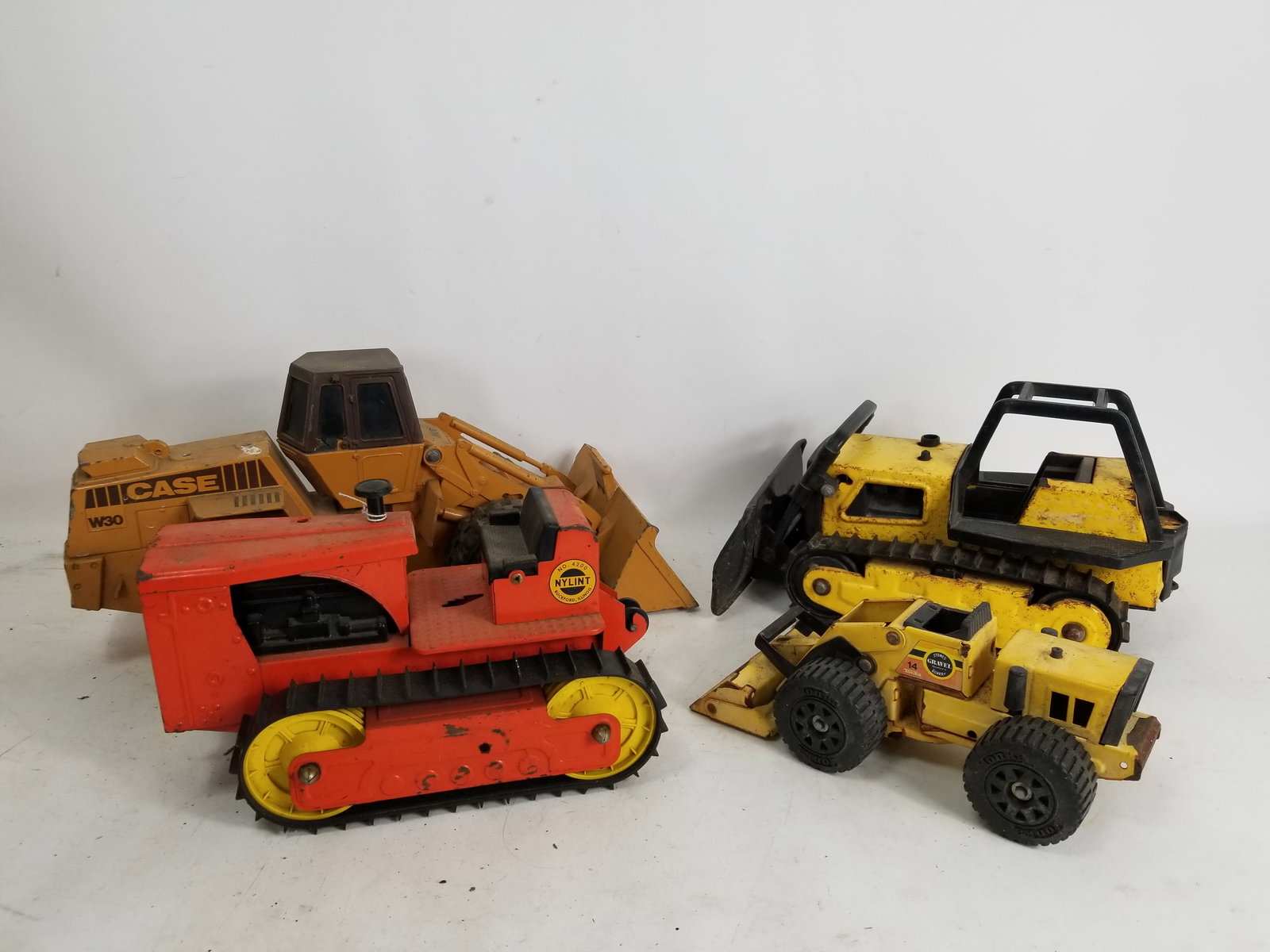Vintage Construction Vehicle Toy Assortment: Vintage Construction Vehicle Toy Assortment featuring Nylint and TonkaLiteratureBrooks Auction – Online Auction Terms & Conditions Contact: (856) 694-2960 | info@brooks.auction READ BEFORE YOU