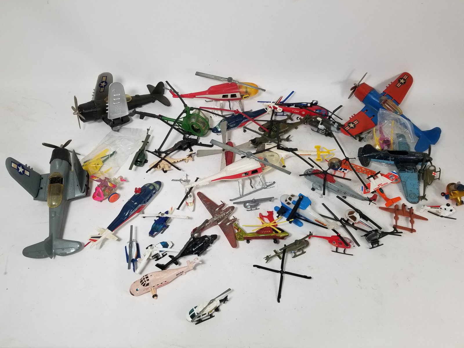 Assortment of Toy Helicopters: Assortment of Toy HelicoptersLiteratureBrooks Auction – Online Auction Terms & Conditions Contact: (856) 694-2960 | info@brooks.auction READ BEFORE YOU BID: We want you to feel confident when