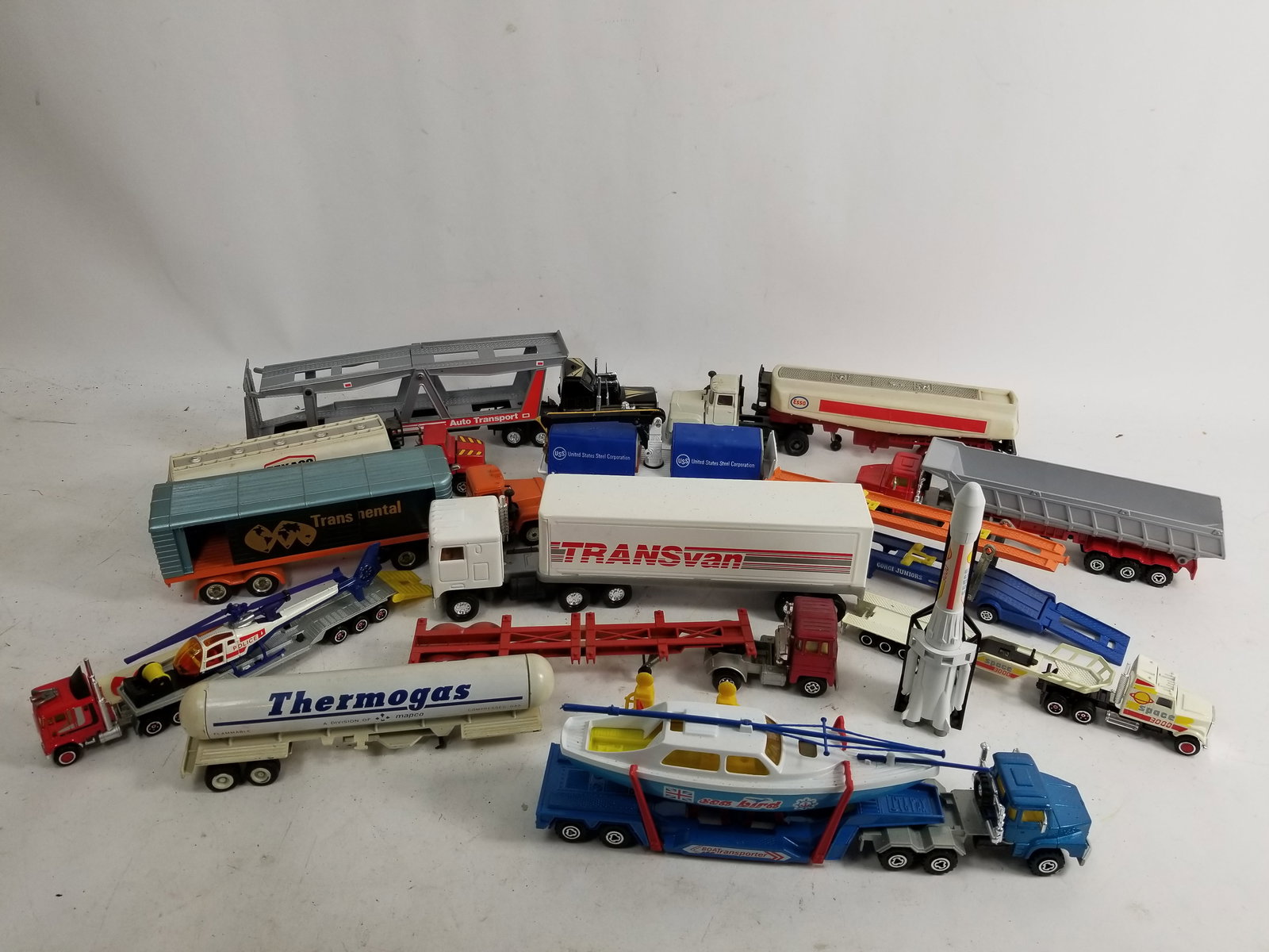 Assortment of Model and Toy Trucks: Assortment of Model and Toy Trucks Literature Brooks Auction – Online Auction Terms & Conditions Contact: (856) 694-2960 | info@brooks.auction READ BEFORE YOU BID: We want you to feel confident