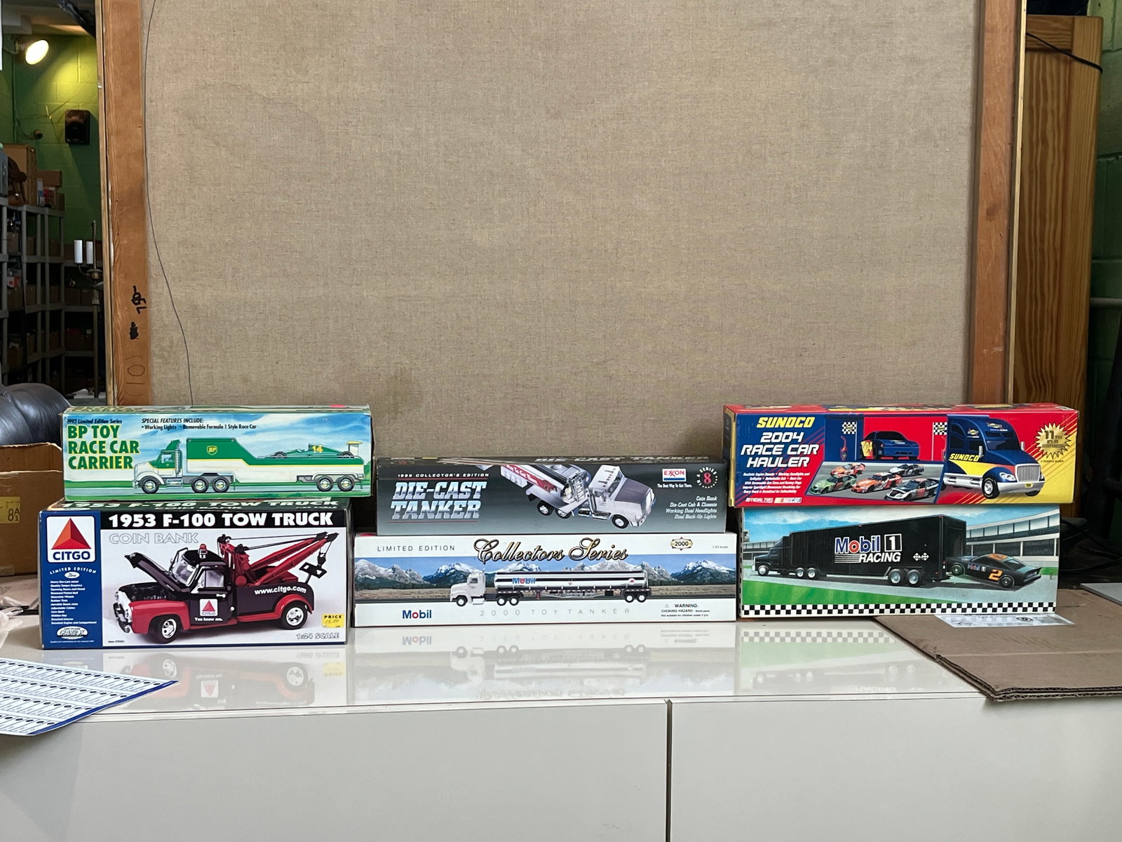 Assortment of Gas and Oil Company Toy Vehicles in Original Boxes: Assortment of Gas and Oil Company Toy Vehicles in Original Boxes featuring Citgo, BP, Sunoco, Exxon and Mobil. Literature Brooks Auction – Online Auction Terms & Conditions Contact: (856) 694-29