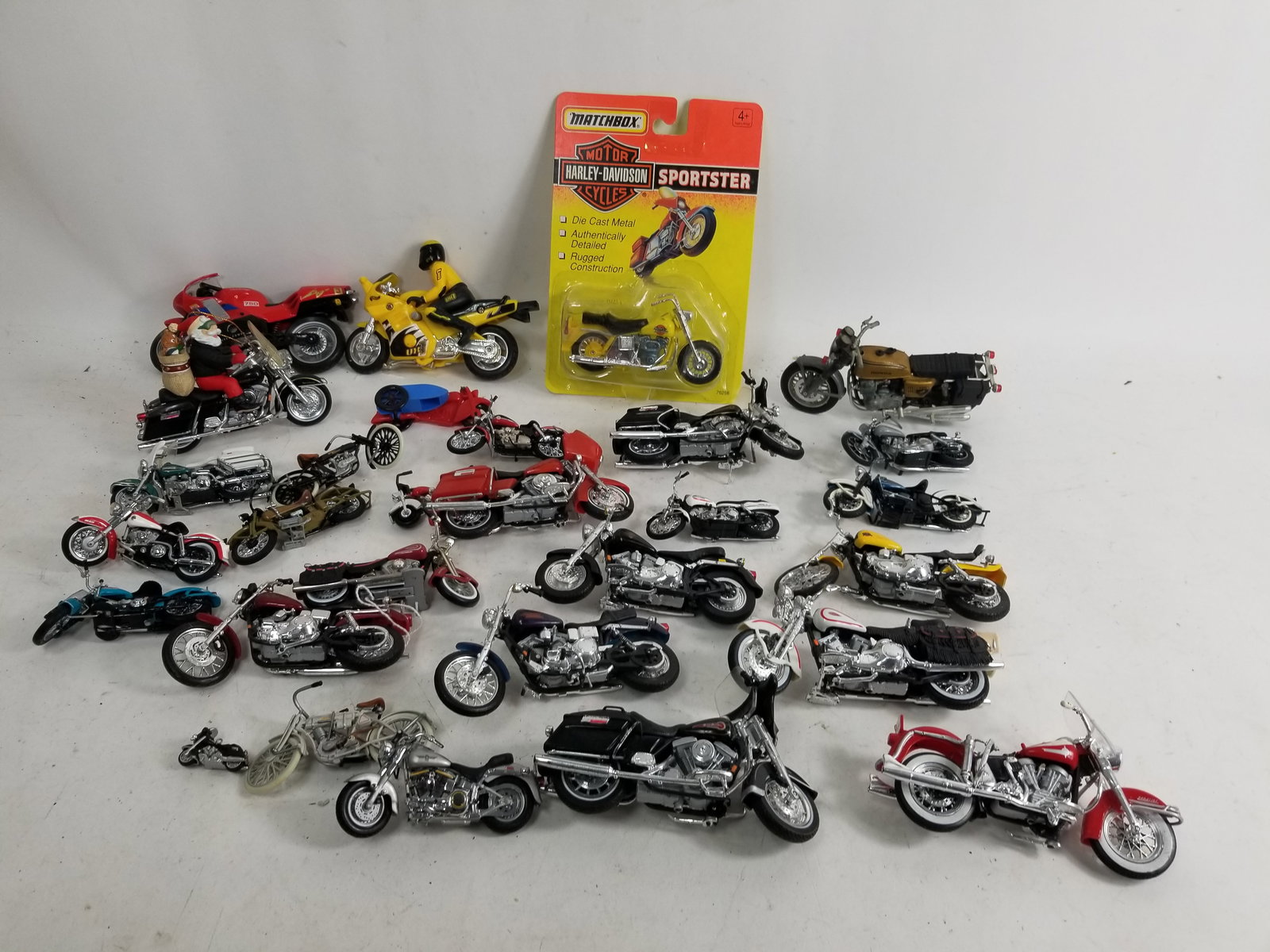 Assortment of Model and Toy Motorcycles: Assortment of Model and Toy Motorcycles featuring Harley Davidson Literature Brooks Auction – Online Auction Terms & Conditions Contact: (856) 694-2960 | info@brooks.auction READ BEFORE YOU BID: