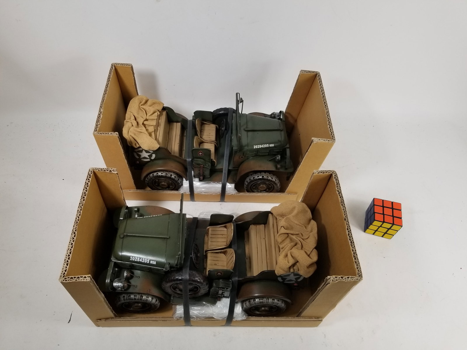 Pair of Model Army Trucks in Original Boxes: Pair of Model Army Trucks in Original Boxes Literature Brooks Auction – Online Auction Terms & Conditions Contact: (856) 694-2960 | info@brooks.auction READ BEFORE YOU BID: We want you to feel c