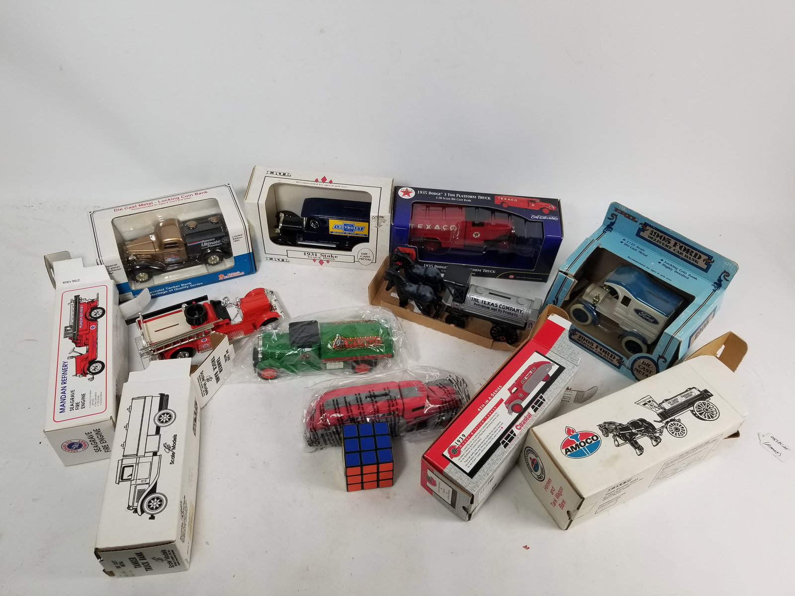 Assortment of Die Cast Car Banks in Original Boxes: Assortment of Die Cast Car Banks in Original Boxes Literature Brooks Auction – Online Auction Terms & Conditions Contact: (856) 694-2960 | info@brooks.auction READ BEFORE YOU BID: We want you to