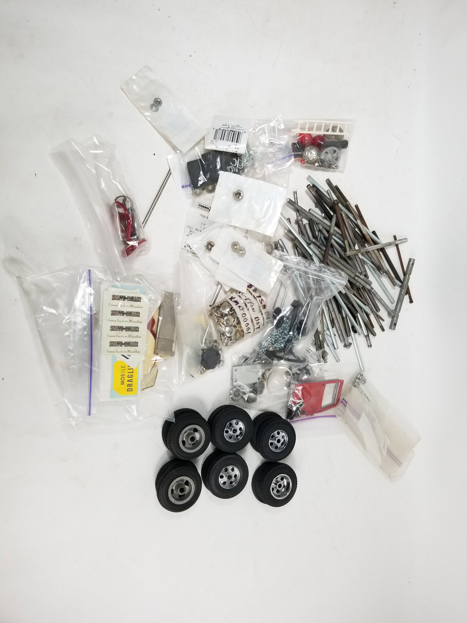 Assortment of Smith Miller Truck Parts: Assortment of Smith Miller Truck Parts Literature Brooks Auction – Online Auction Terms & Conditions Contact: (856) 694-2960 | info@brooks.auction READ BEFORE YOU BID: We want you to feel confid