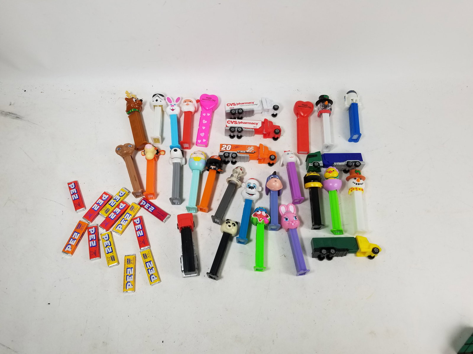 Assortment of Vintage and Modern PEZ Dispensers: Assortment of Vintage and Modern PEZ DispensersLiteratureBrooks Auction – Online Auction Terms & Conditions Contact: (856) 694-2960 | info@brooks.auction READ BEFORE YOU BID: We want you to