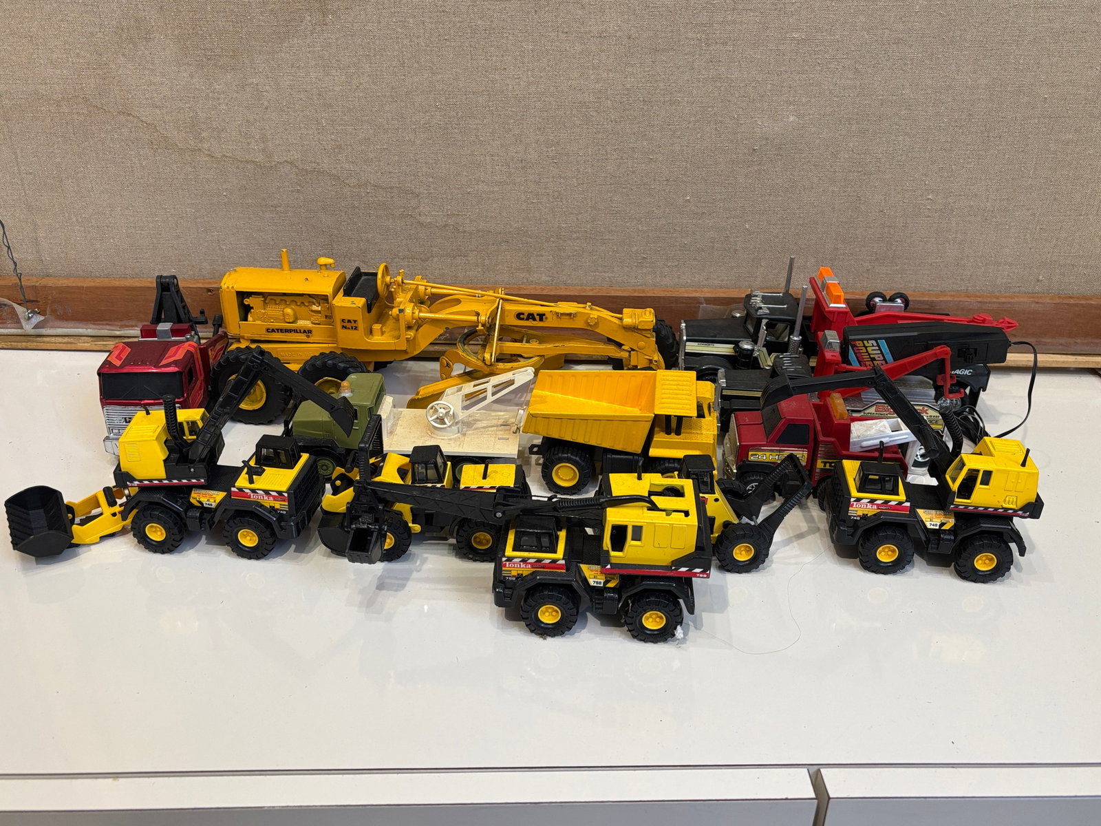 Assortment of Work Trucks: Assortment of Work Trucks featuring towing, cranes, etc. Literature Brooks Auction – Online Auction Terms & Conditions Contact: (856) 694-2960 | info@brooks.auction READ BEFORE YOU BID: We want