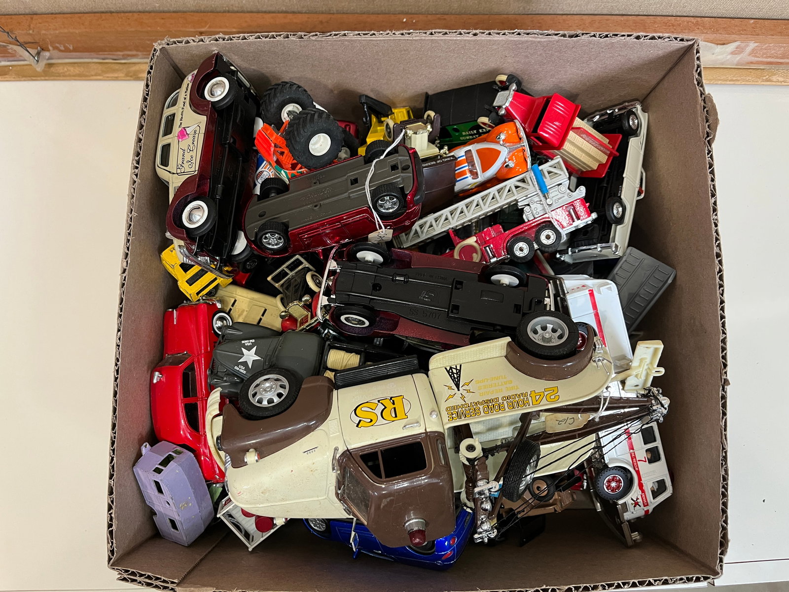 Assortment of Toy and Model Vehicles: Assortment of Toy and Model Vehicles Literature Brooks Auction – Online Auction Terms & Conditions Contact: (856) 694-2960 | info@brooks.auction READ BEFORE YOU BID: We want you to feel confiden