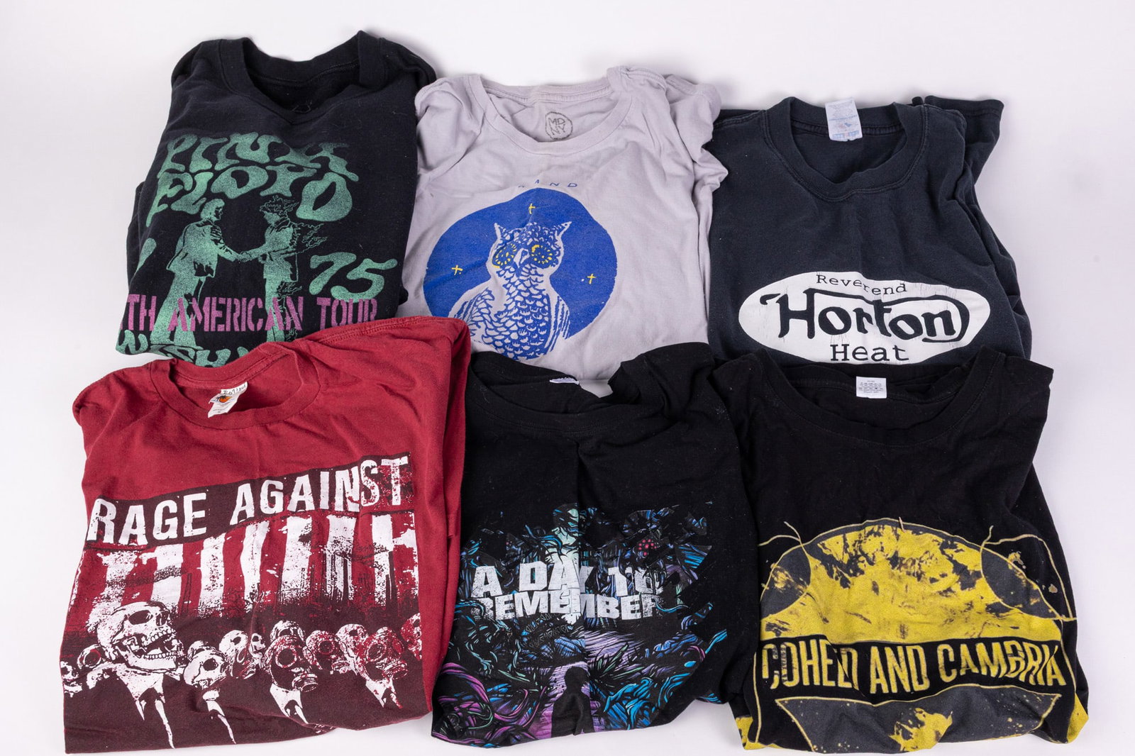 Assortment of Band Merch ft. Reverend Horton Heat & Rage Against the Machine: Assortment of Band Merch ft. Reverend Horton Heat & Rage Against the Machine Size L-XL Literature Brooks Auction – Online Auction Terms & Conditions ——————