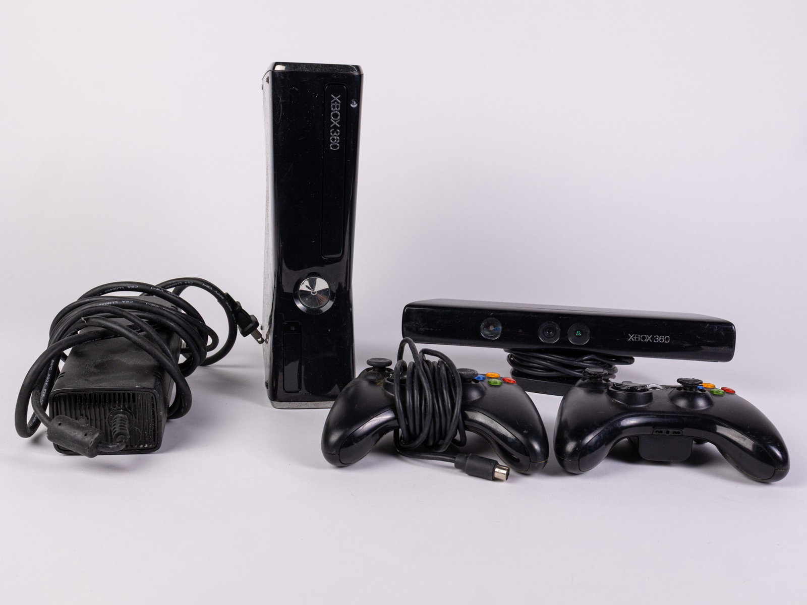 XBOX 360 S System w/ Kinect & Accessories: XBOX 360 S System w/ Kinect & Accessories Size 7" x 12" x 12" Literature Brooks Auction – Online Auction Terms & Conditions ——————————