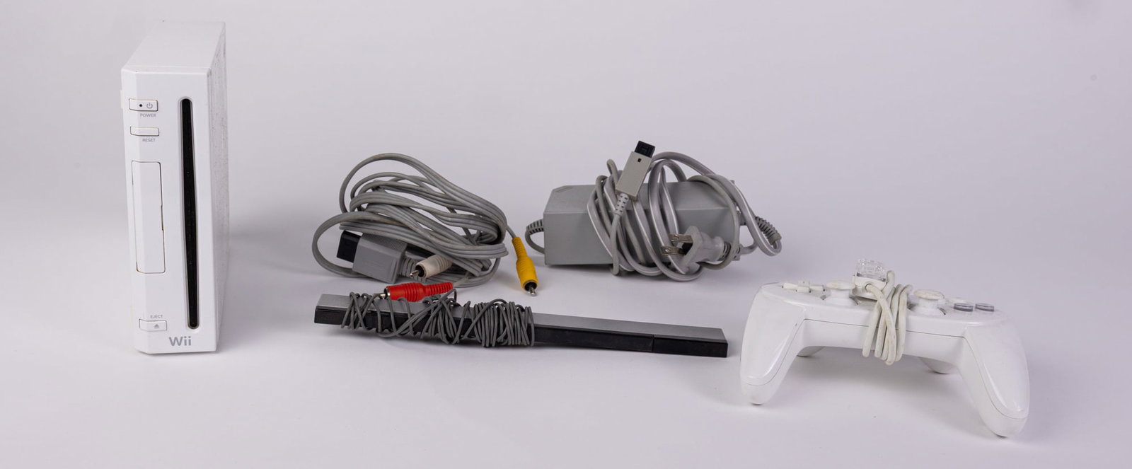 Nintendo Wii System w/ Accessories: Nintendo Wii System w/ AccessoriesSize7" x 12" x 12"LiteratureBrooks Auction – Online Auction Terms & Conditions