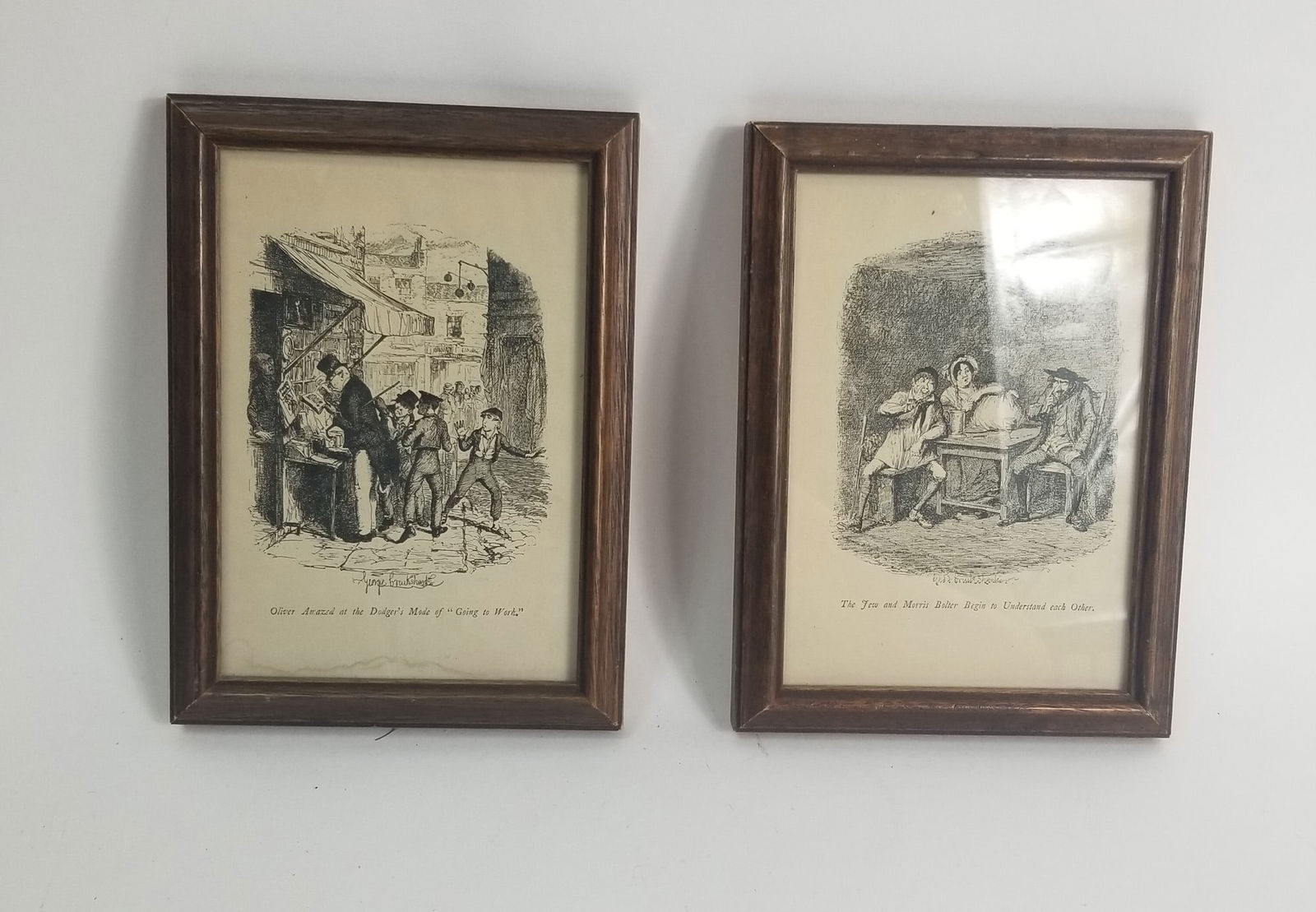 Pair of Framed Charles Dickens Book Plates: Pair of Framed Charles Dickens Book Plates, originally purchased at the "Dickens Old Curiosity Shop", plates depict "The Jew and Morris Bolter Begin to Understand each Other" and "Oliver Amazed at the