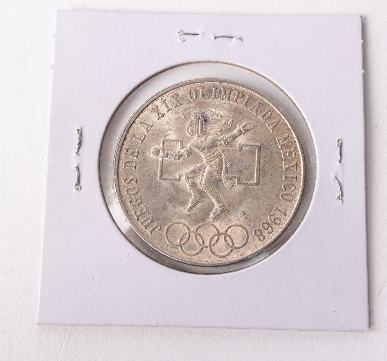 1968 Mexico 25 Peso silver Aztec Coin: 1968 Mexico 25 Peso silver Aztec Coin to Commemorate the first Olympic Games in Latin America. also known as "The aztec Ball Player" Literature Brooks Auction – Online Auction Terms & Conditions