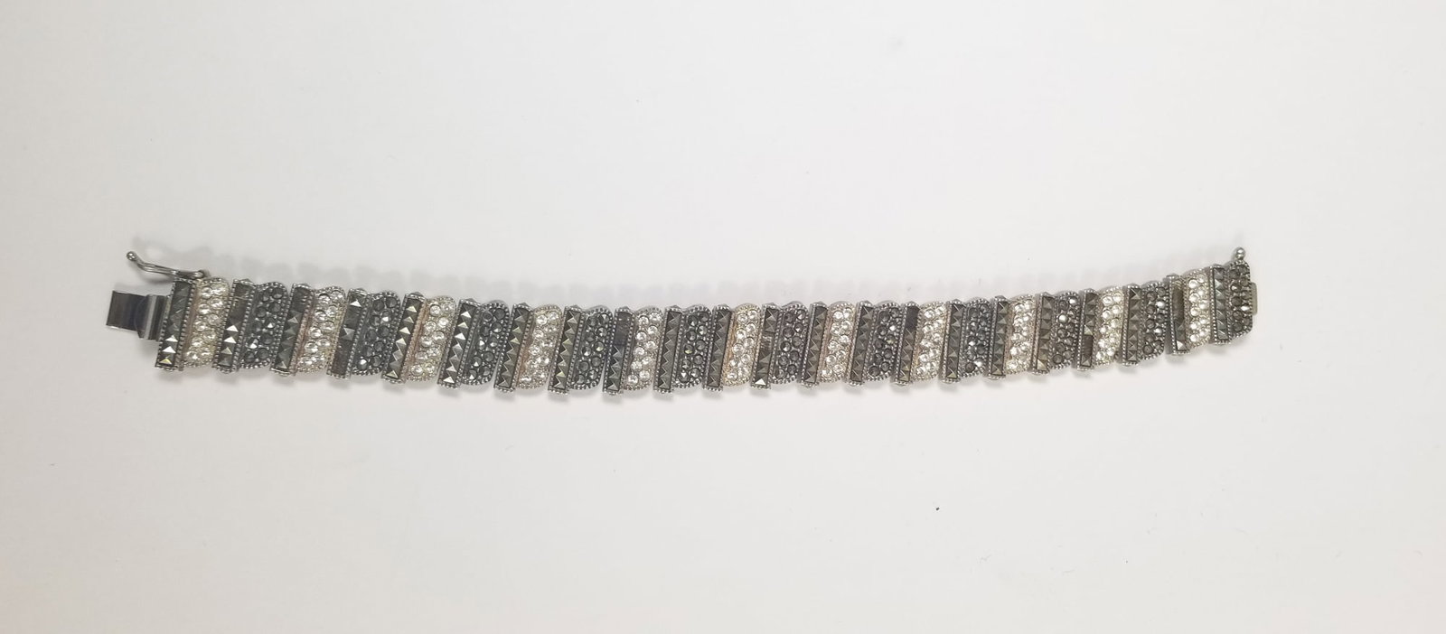 Vintage Sterling Silver Bracelet 615/1000: Vintage Sterling Silver Bracelet 615/1000 Stamped Sterling under clasp and "Retro 2000 615/100"LiteratureBrooks Auction – Online Auction Terms & Conditions