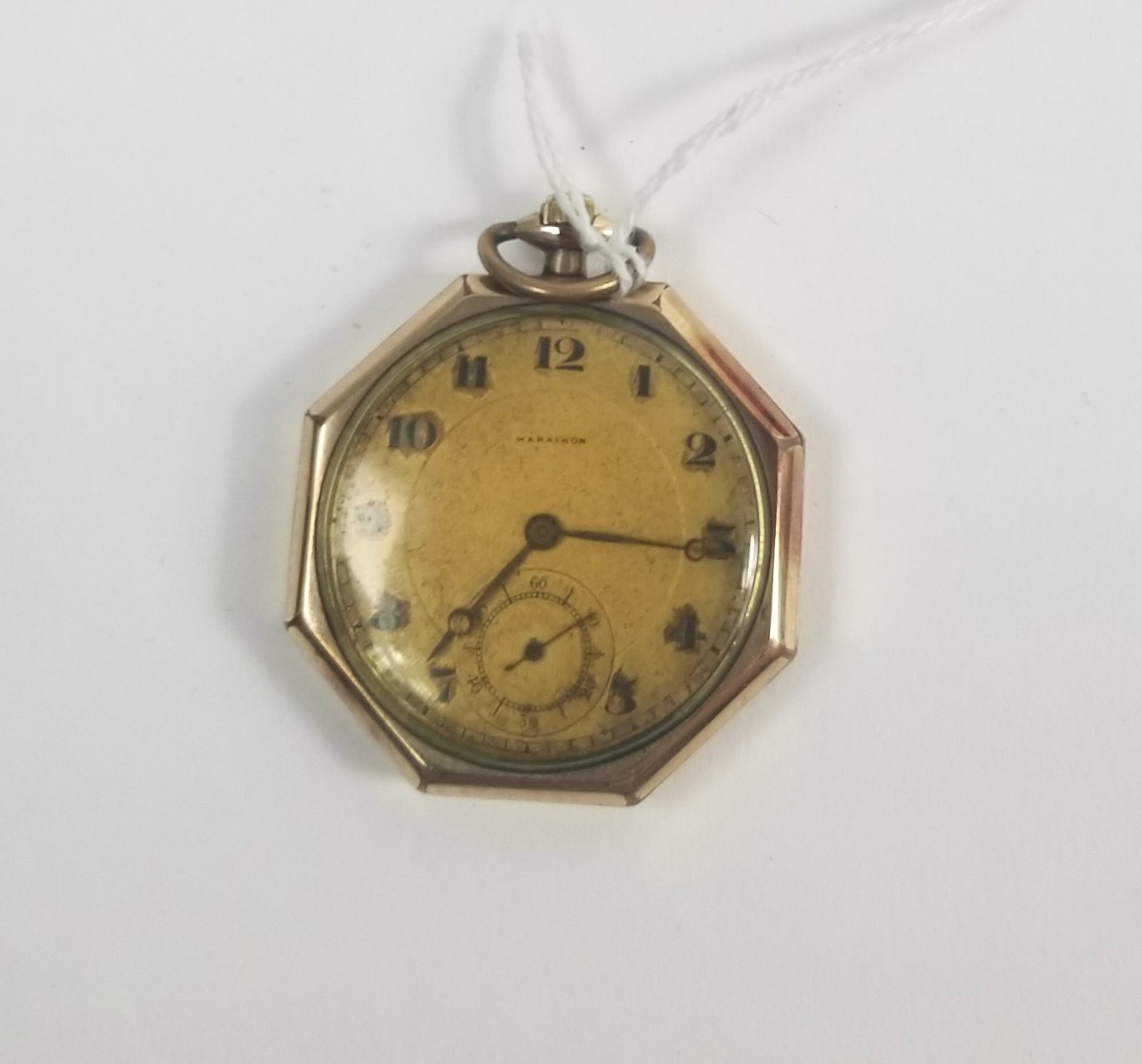 Vintage Octagonal Pocket watch: Vintage Octagonal his and her Pocket watches both tested Positive For 14k gold Likely Plating previous owner wrote 19J GF on a tag and attached it to the Watch with the marathon face In working
