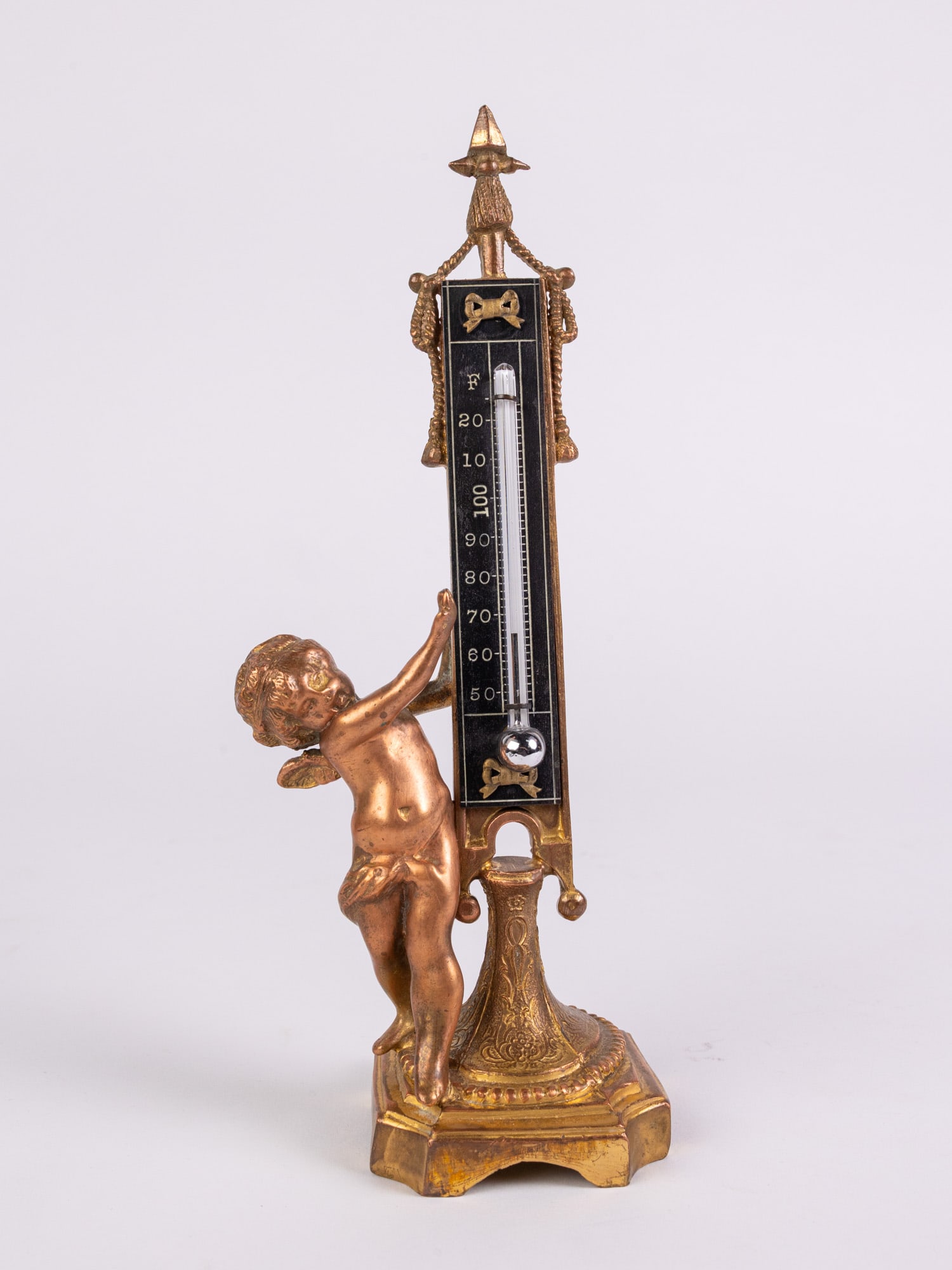 Figural Cherub Brass Desktop Mercury Thermometer: Figural Cherub Brass Desktop Mercury ThermometerLiteratureBrooks Auction – Online Auction Terms & Conditions Contact: (856) 694-2960 | info@brooks.auction READ BEFORE YOU BID: We want you to