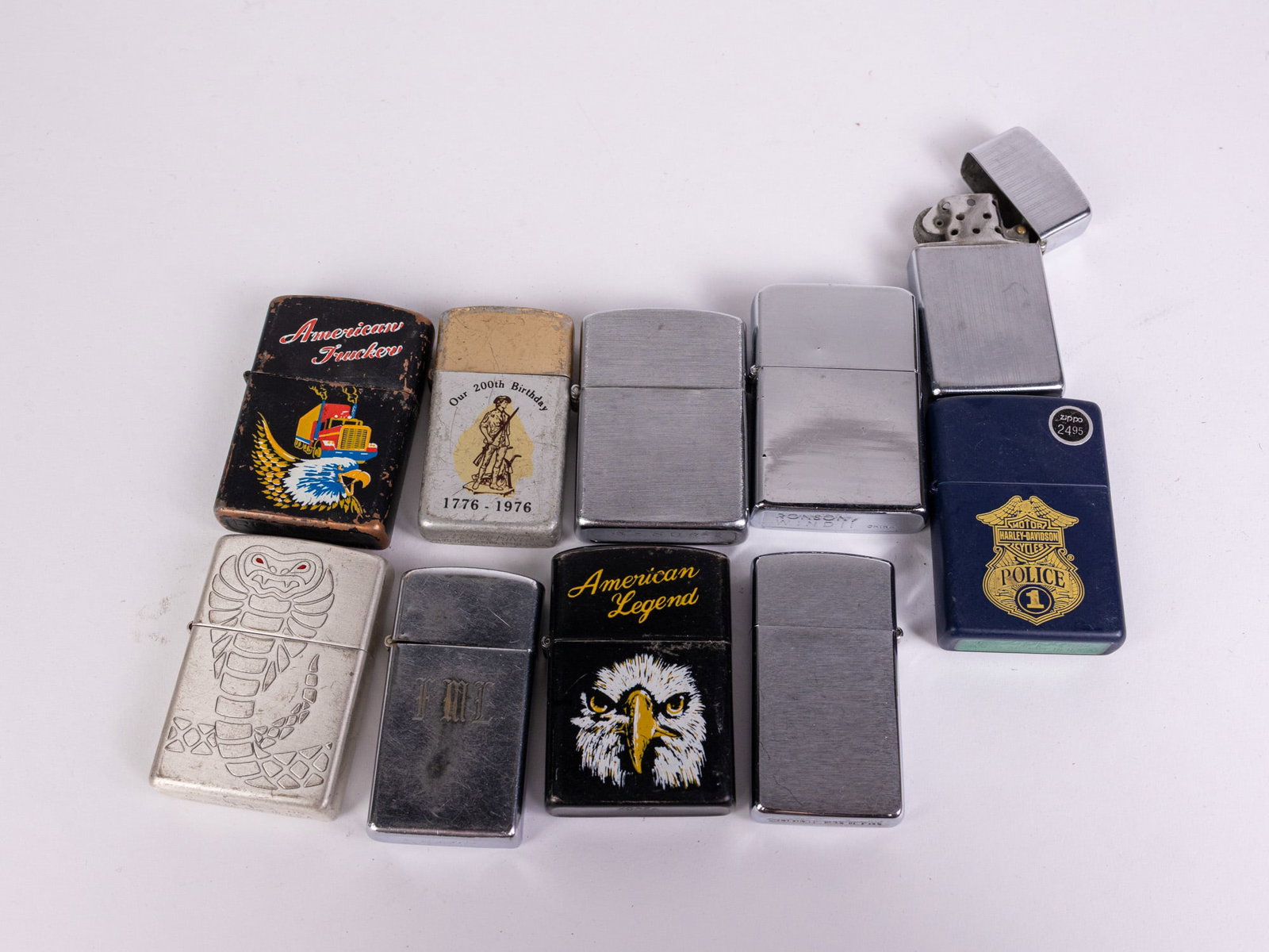 Lot of Assorted Zippo Lighters: Lot of Assorted Zippo Lighters Size 7" x 12" x 12" Literature Brooks Auction – Online Auction Terms & Conditions Contact: (856) 694-2960 | info@brooks.auction READ BEFORE YOU BID: We wan